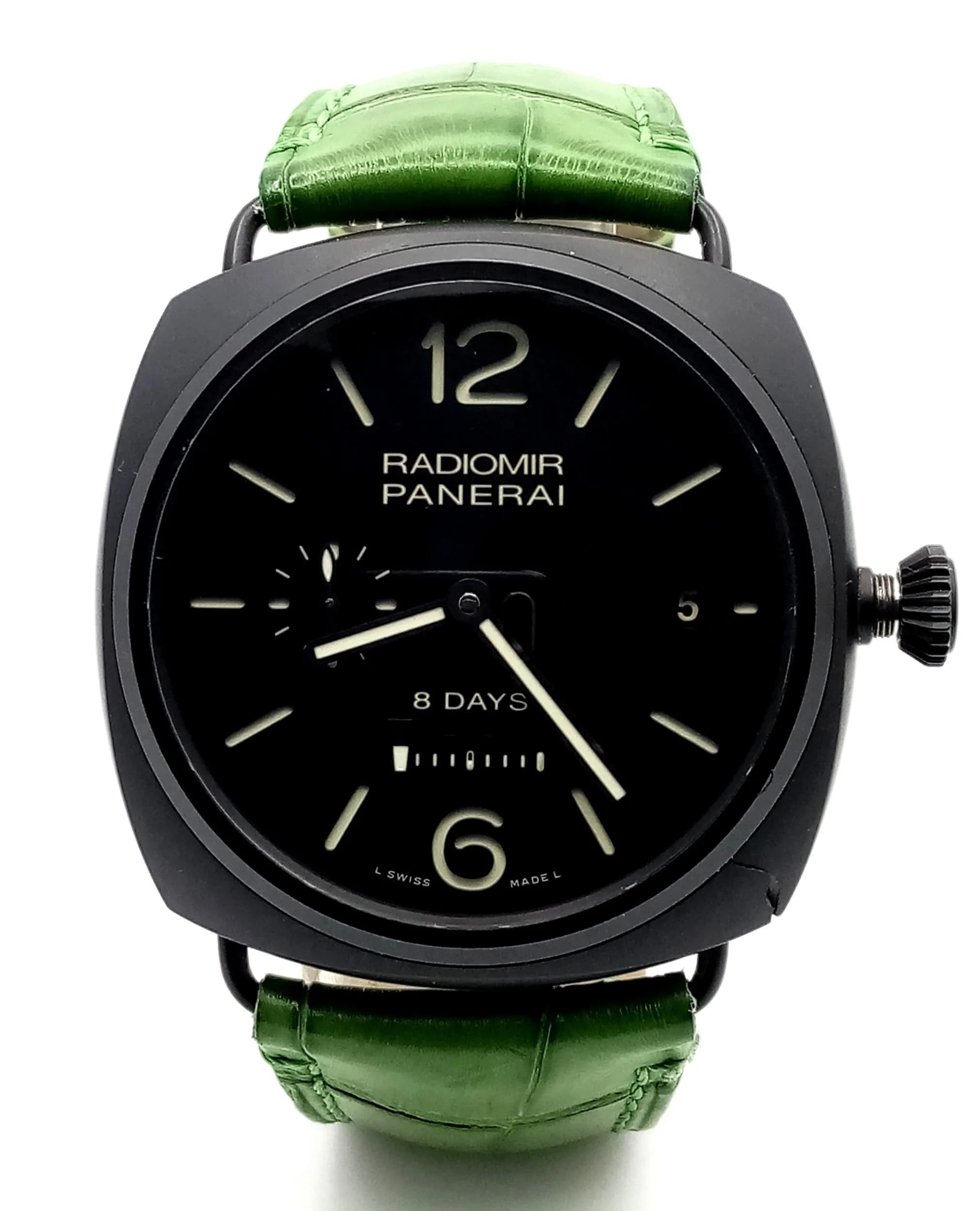 A Panerai Radiomir Manuel-Wind Gents Watch. Green leather strap. Black ceramic case - 45mm. Black dial with second sub dial and 8 day power supply gauge. Skeleton back. Comes with case and papers. In good condition and working order. Ref: 024495.