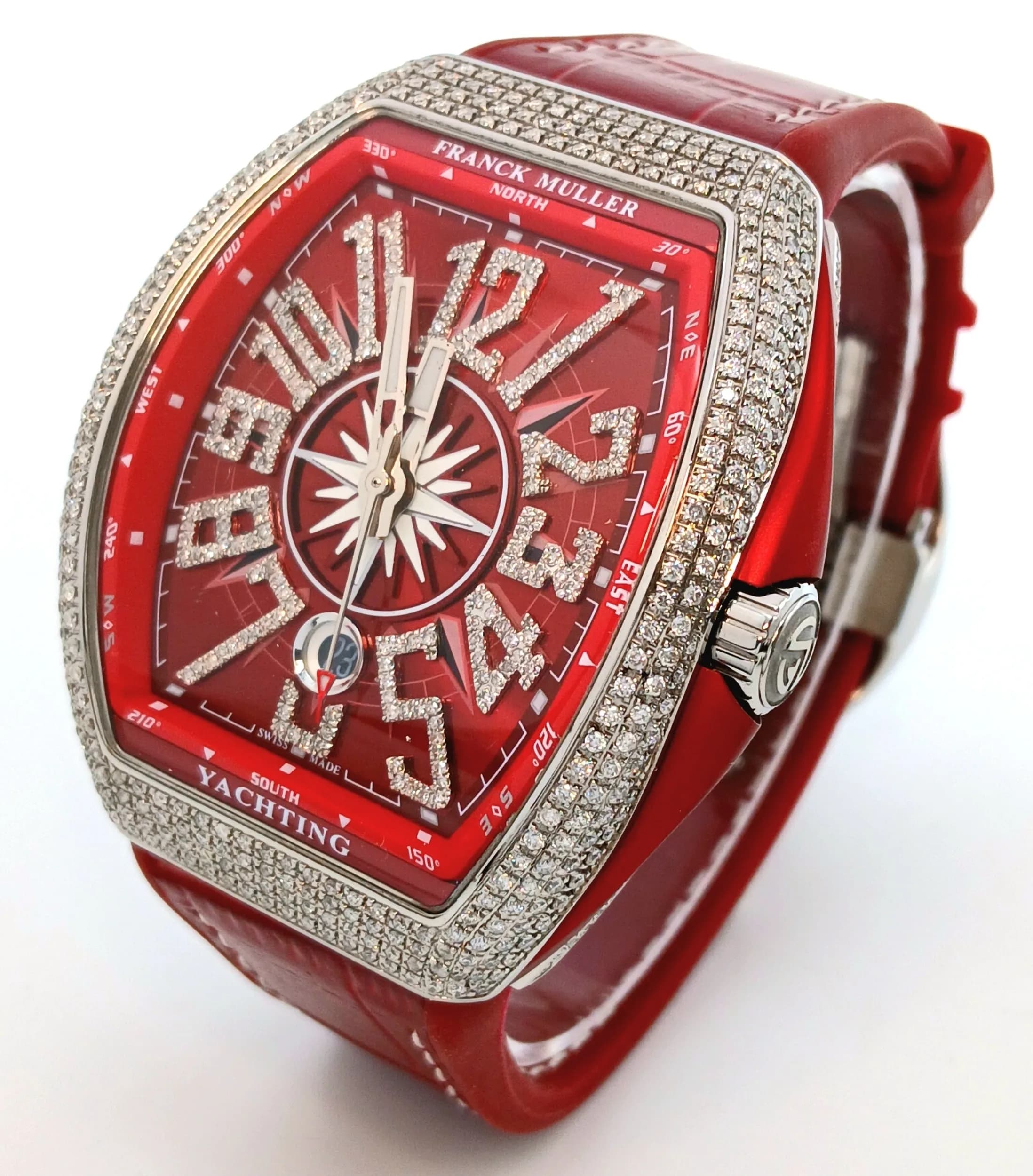 A Franck Muller Yachting Automatic Diamond Gents Watch. Model V45 SC DT. Red rubber strap. Stainless steel diamond set case - 43mm x 53mm. Red dial with diamond set markers. Date window. In good condition and working order. Note: Diamonds have been professionally custom fitted.