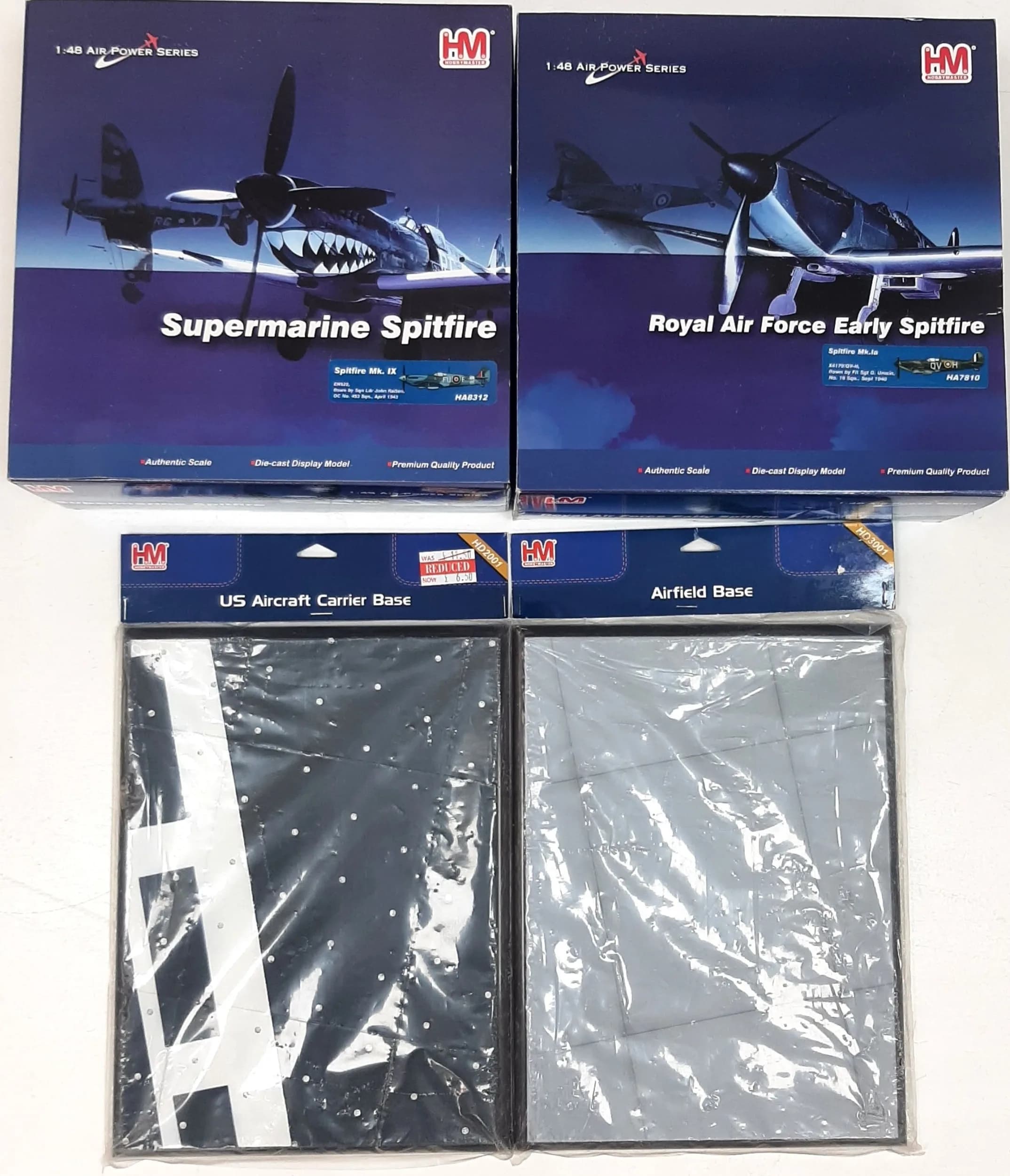 Two Hobby Master, air power series, 1/48 scale die cast Spitfire models. To include a Supermarine Spitfire and a Royal Airforce Early Spitfire. Comes with two airfield diorama bases. In very good condition. These have never been out of the boxes on display.