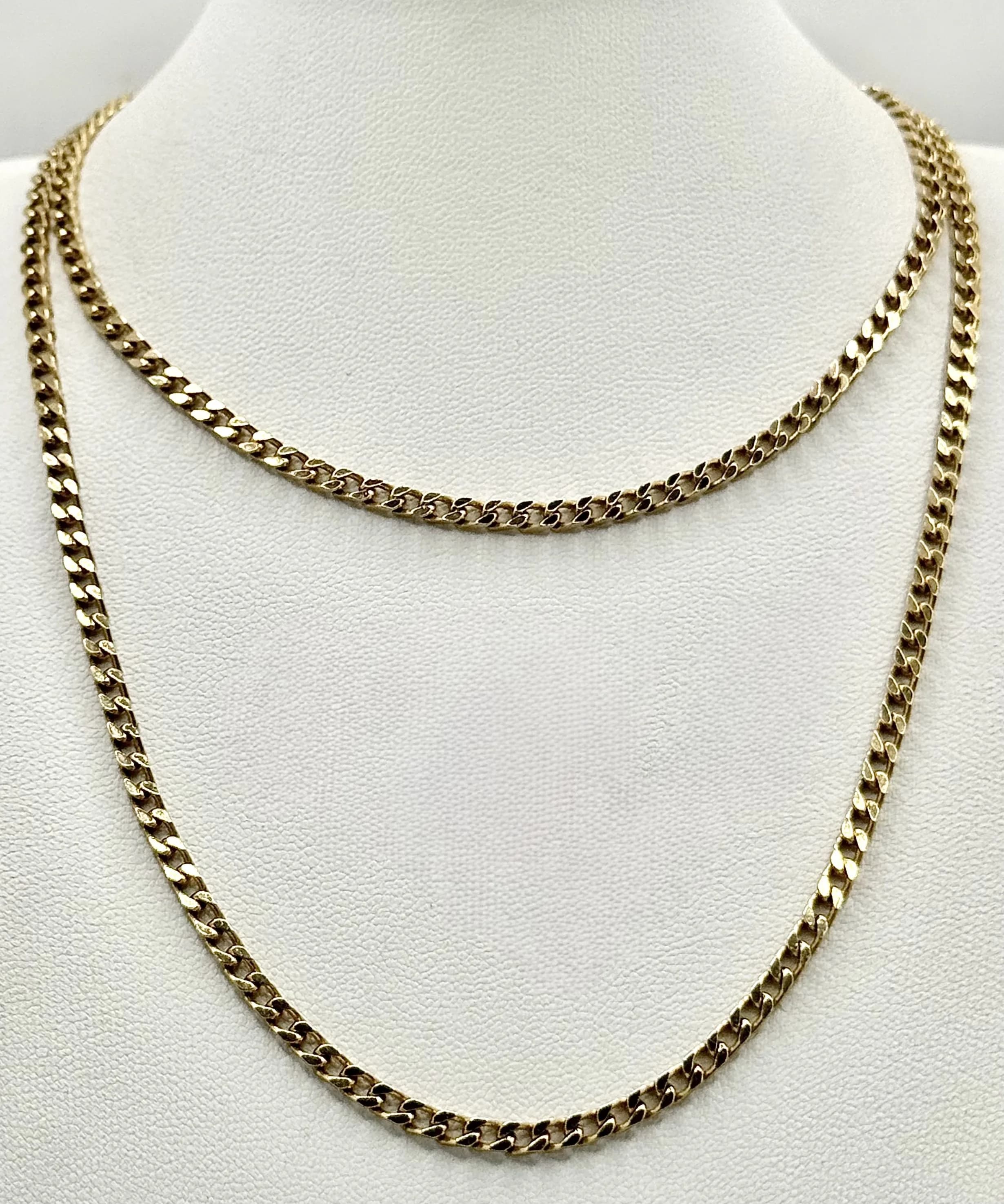 A 9K Yellow Gold Fancy Curb Link Chain Necklace. 68cm. 16.8g.