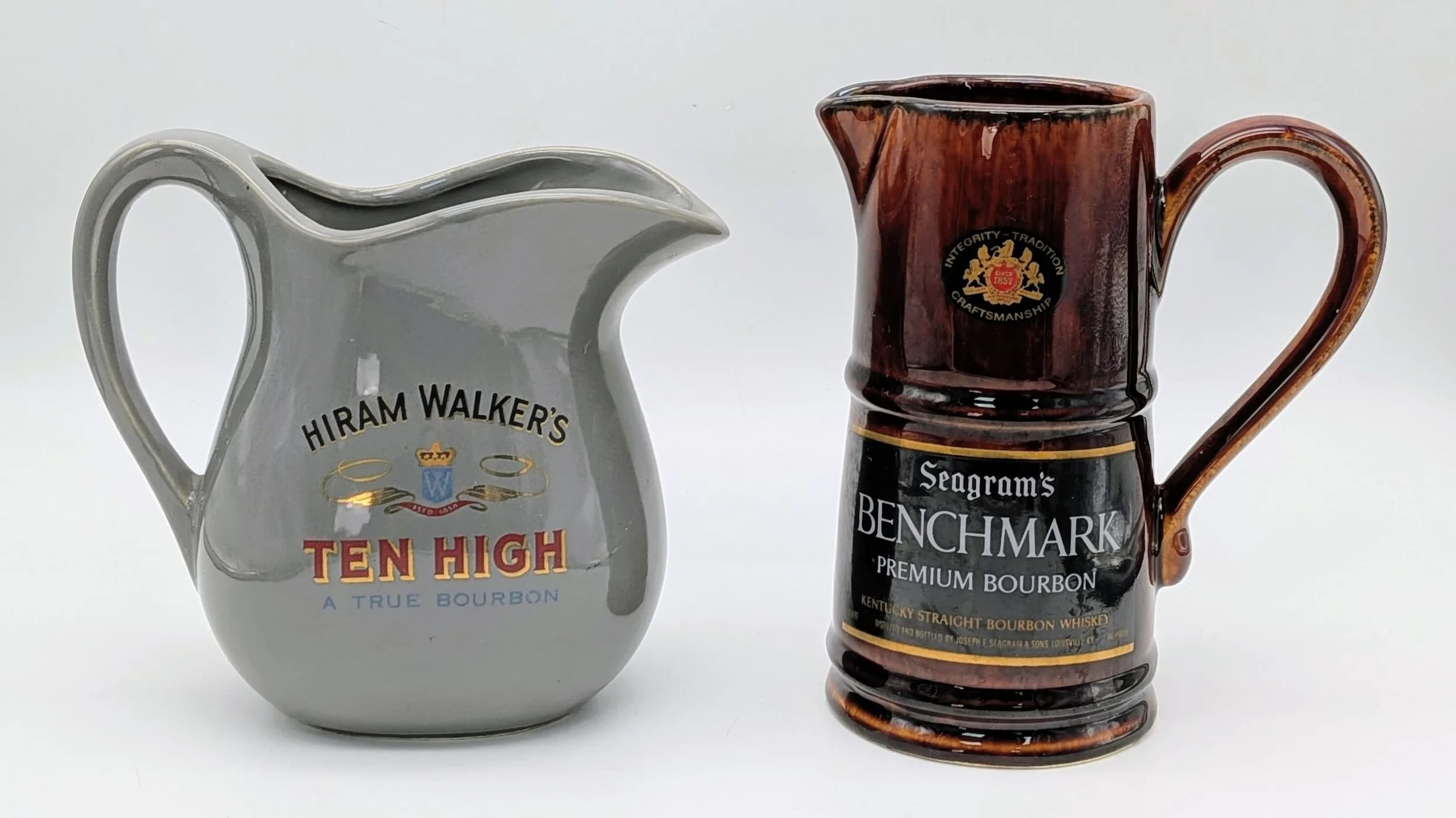 Two Vintage Collectible American Pottery Large Bourbon Whisky Water Jugs. Comprising 1) A Seagrams Benchmark Kentucky Bourbon 19cm Tall and 2) A Hiram Walkers Ten High Bourbon 17cm Tall