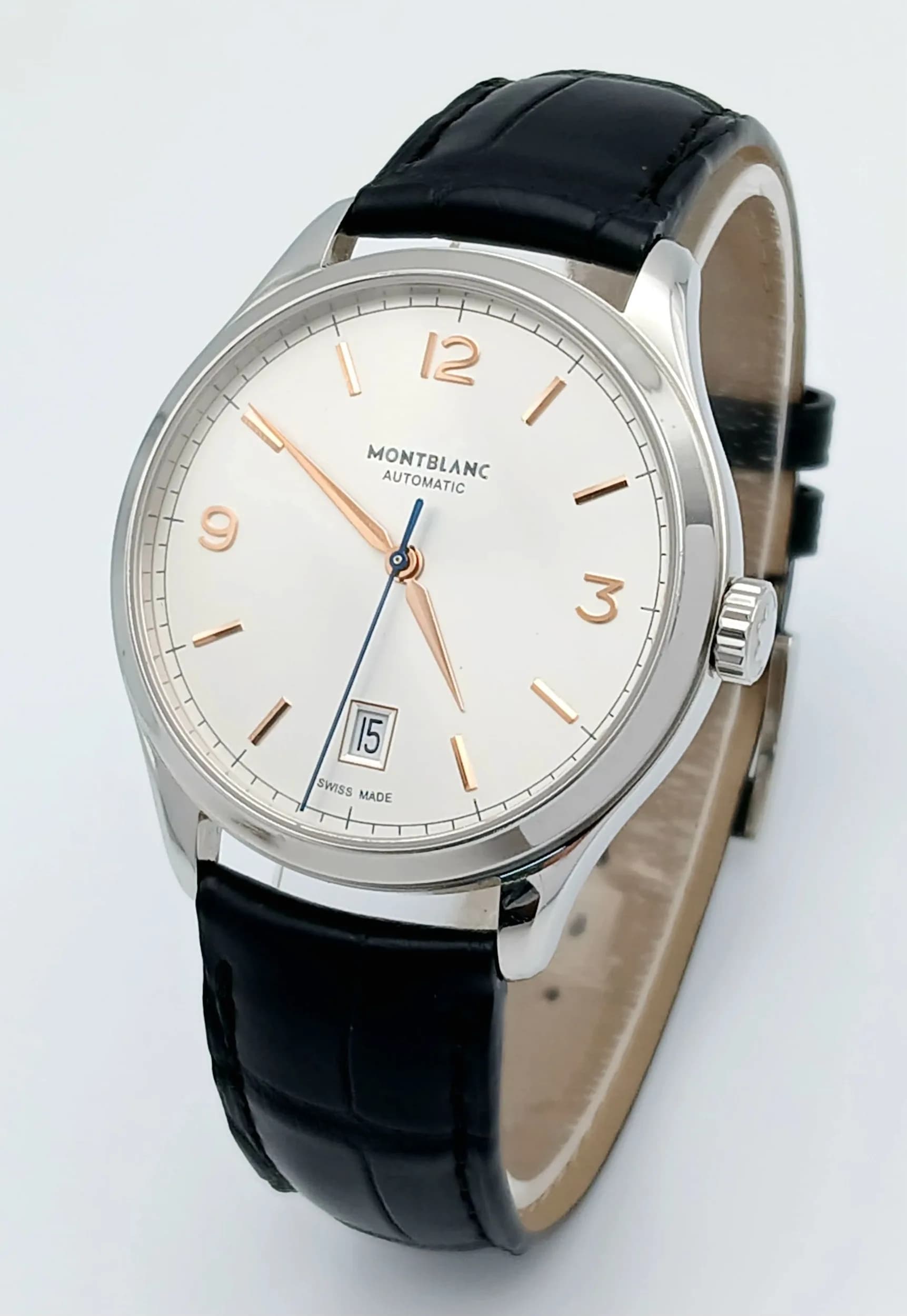 A Montblanc Heritage Automatic Gents Watch. Black leather strap. Stainless steel case - 40mm. Silver tone dial with date window. Skeleton back. In good condition and working order.