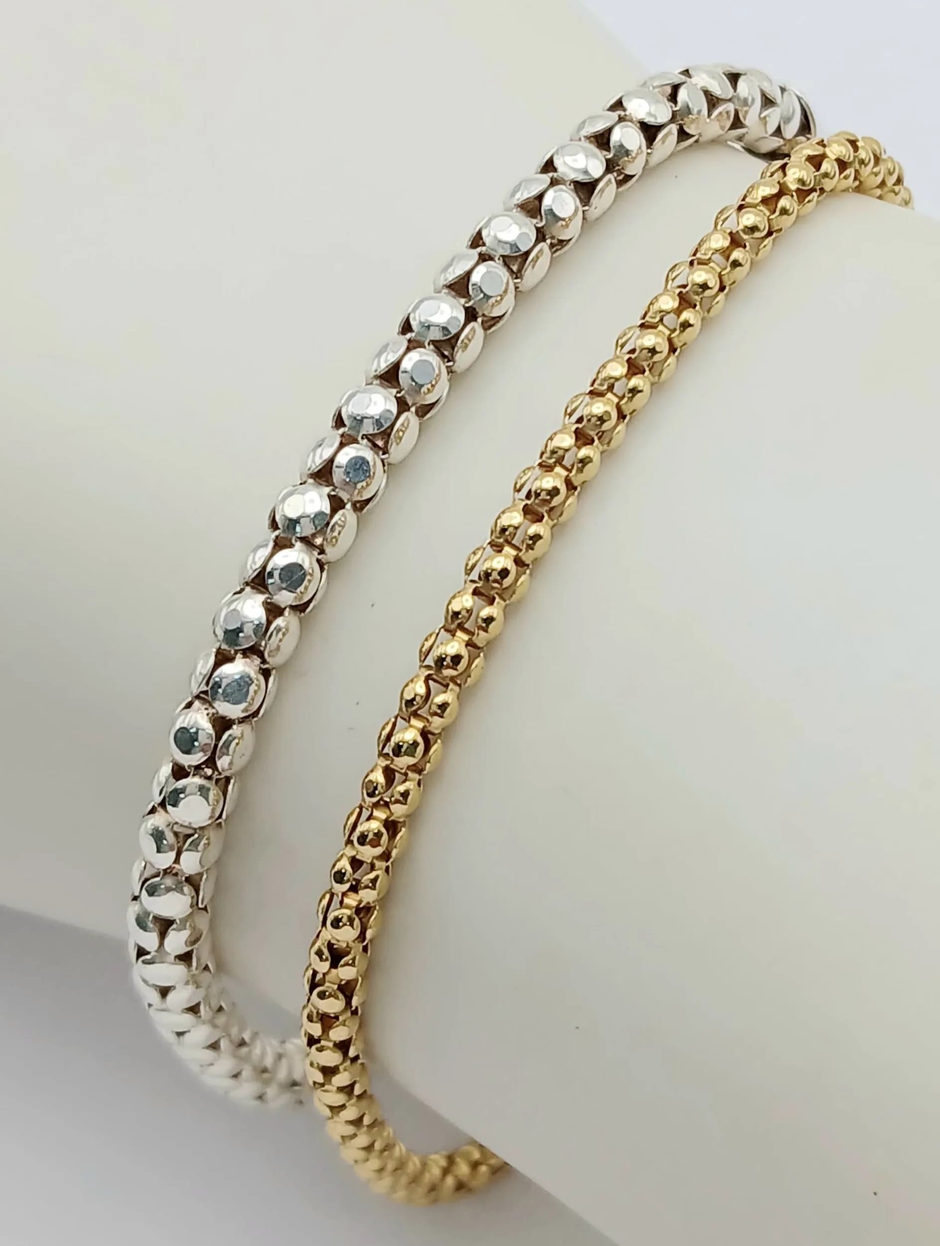 2 x ITALIAN SILVER BRACELETS. To include 1 x 925 SILVER together with 1 x GOLD on SILVER. Both Bracelets are 19 cm. Please see pictures.