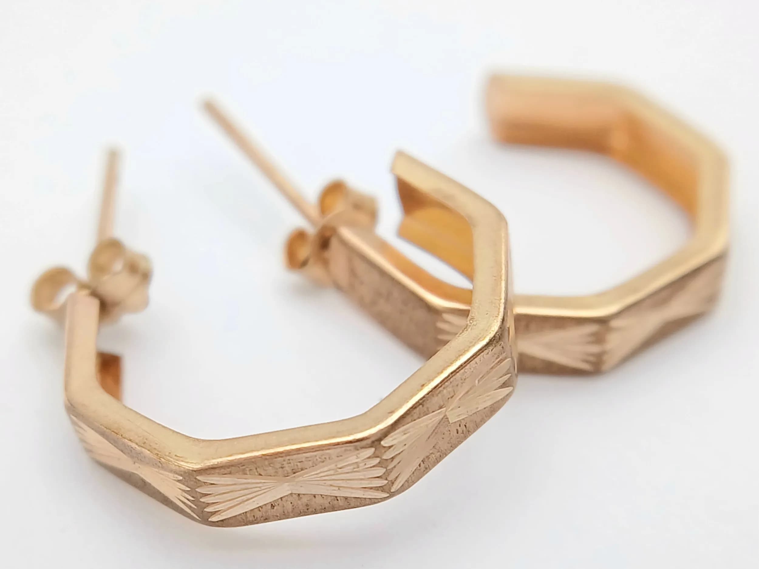 A Pair of 9K Yellow Gold Hexagonal Huggie Earrings. 2cm. 0.85g total weight.