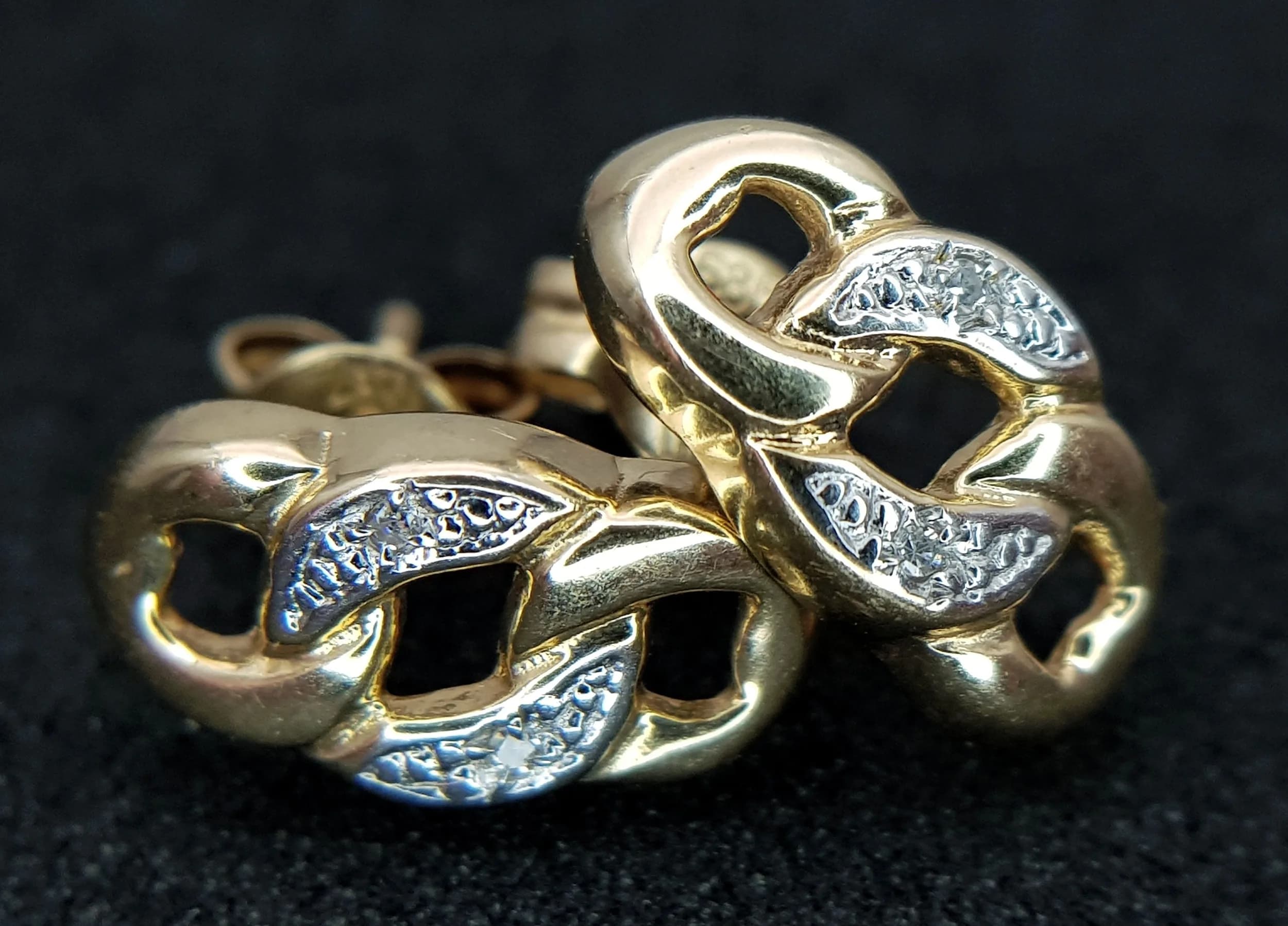 A Pair of 14K Yellow and White Gold, Diamond Huggie Earrings. 1.9g total weight.