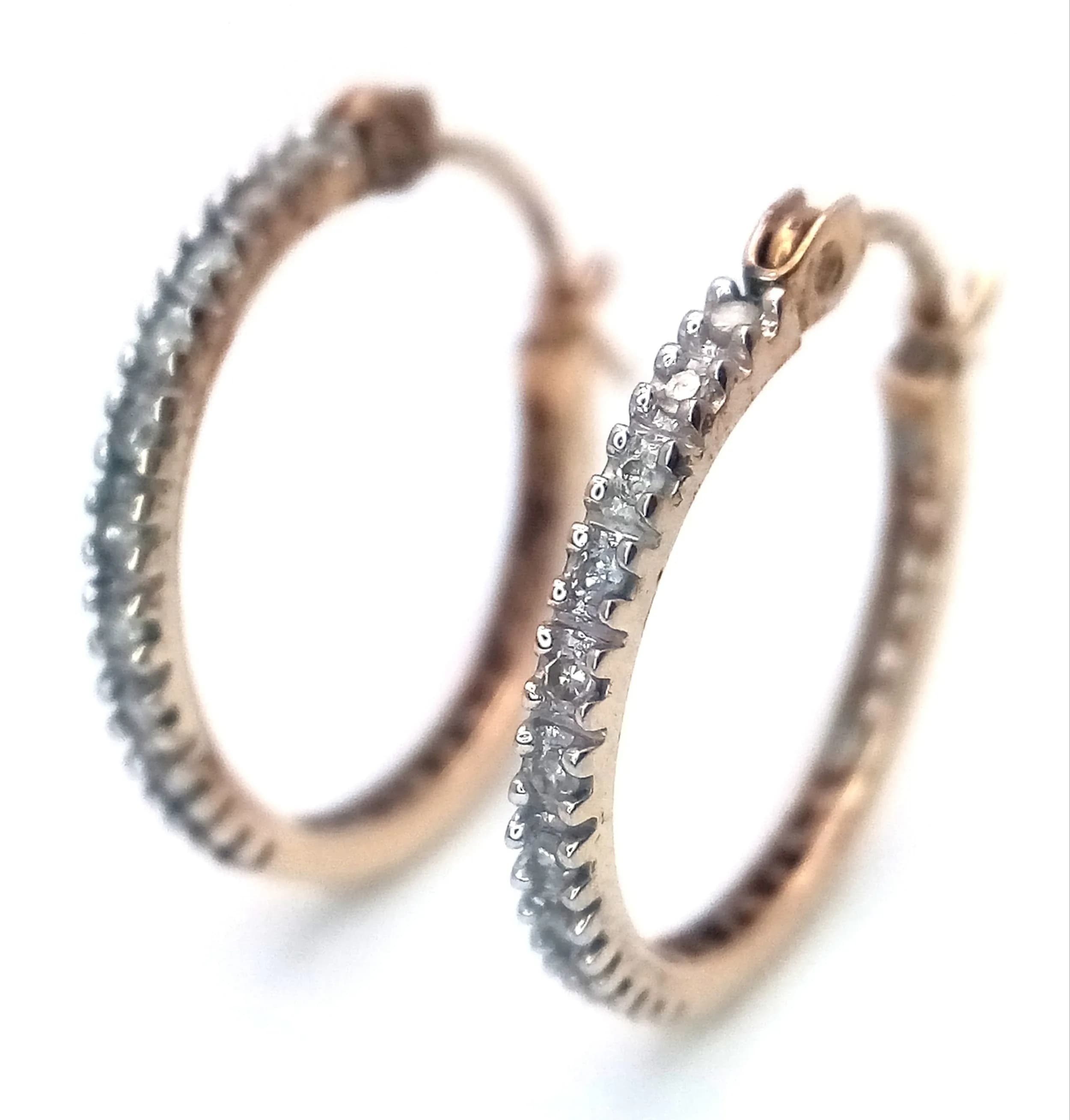 A Pair of 9K Yellow Gold and Diamond Half Eternity Hoop Earrings. 16mm. 1.5g total weight.