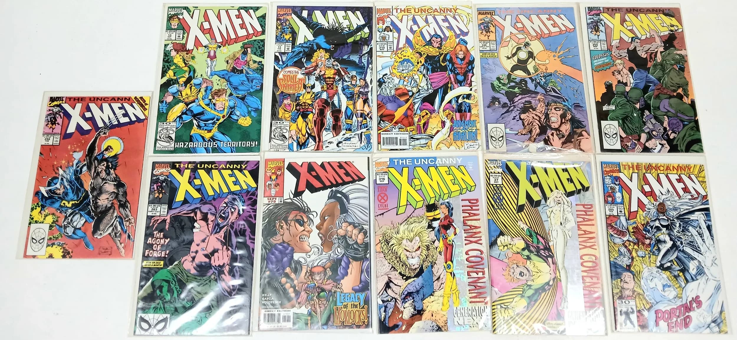 Eleven Marvel X MEN comics. All plastic wrapped. Please see photos for finer details.