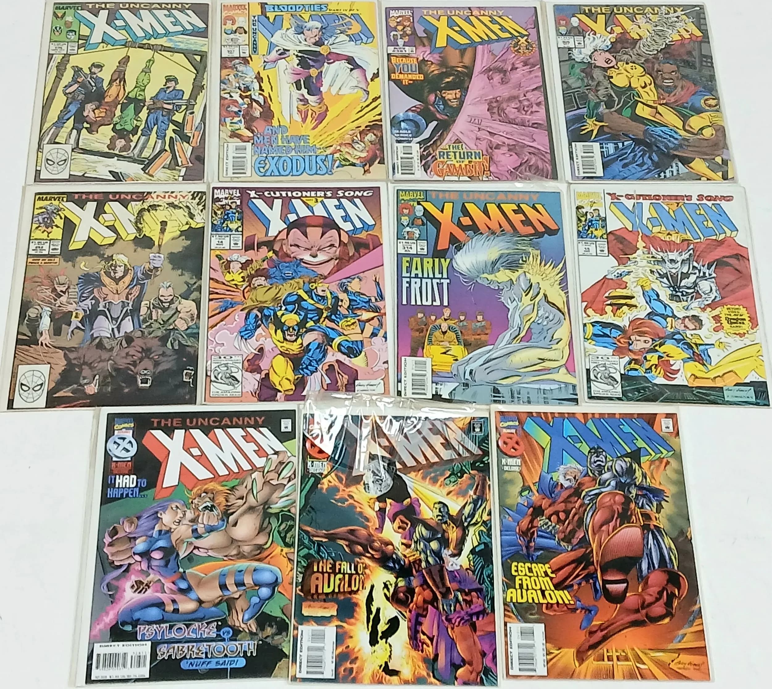 Eleven Marvel X MEN comics. All plastic wrapped. Please see photos for finer details.