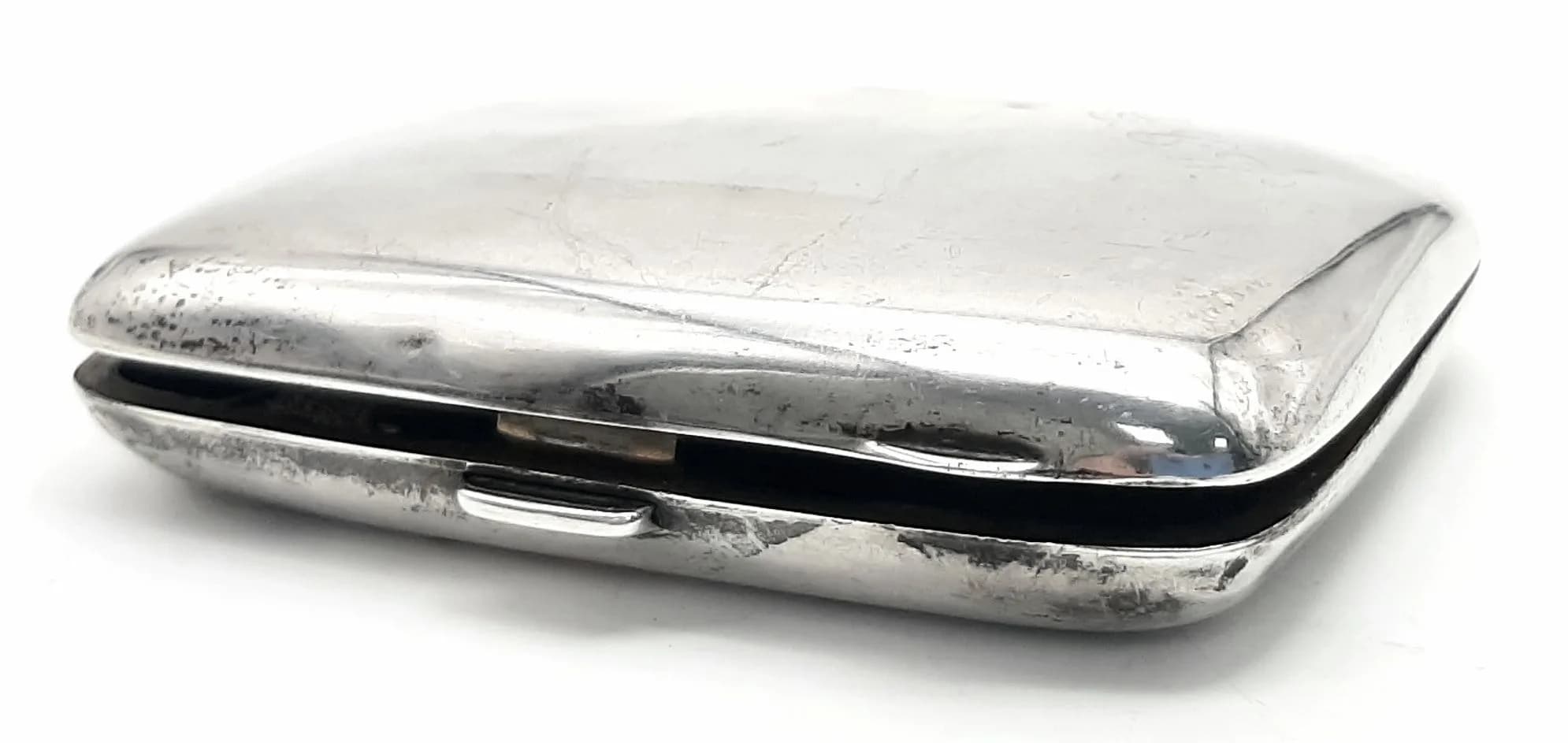 A Sterling Silver Cigarette Case. Hallmarks for Birmingham 1942. 8 x 6cm. 53.5g.