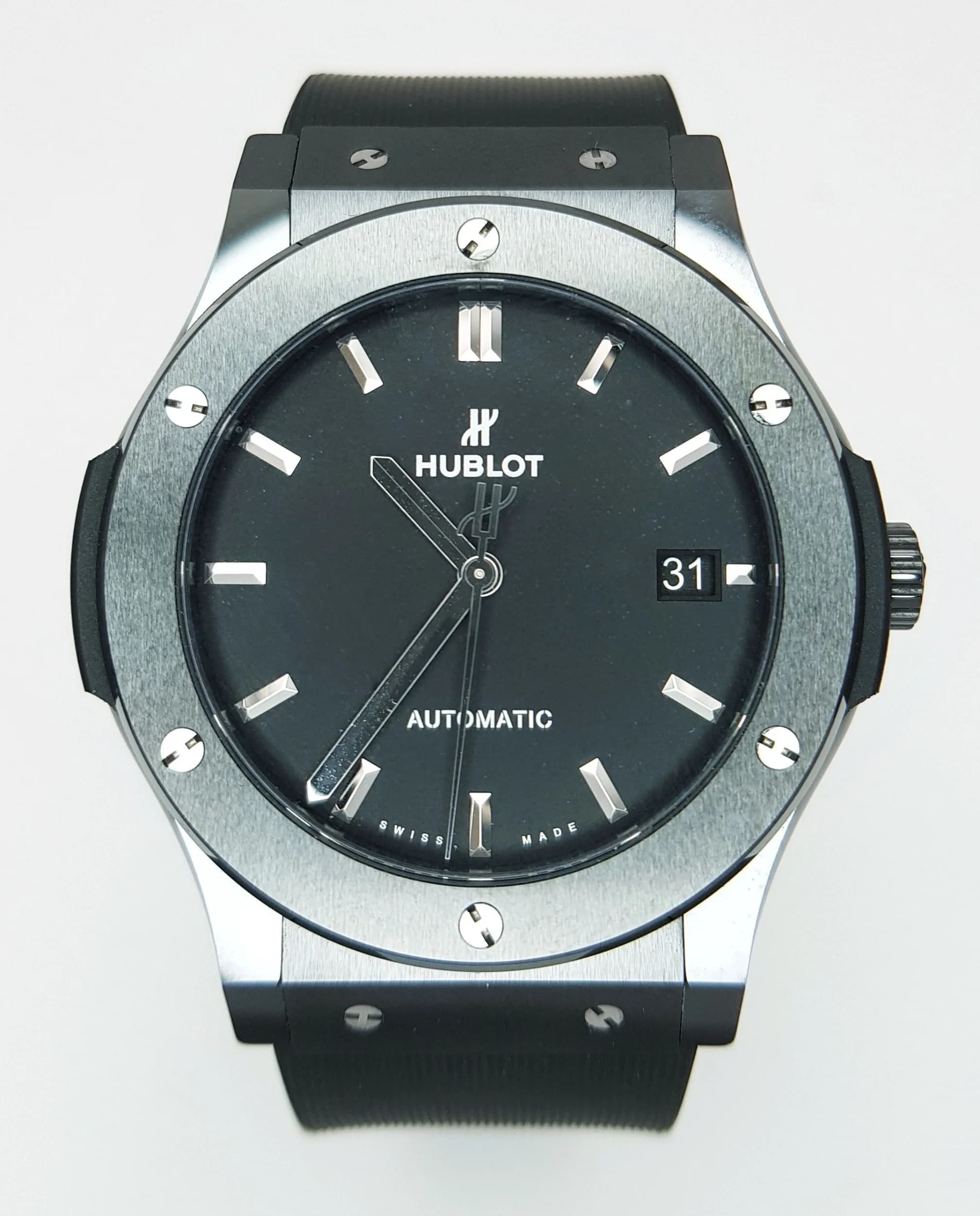 A Hublot Classic Fusion Automatic Gents Watch. Black rubber dial. Polished ceramic case - 42mm. Model 511.CM.1171.RX. Black dial with date window. Skeleton back. Comes with box and WCSA/Watch Register Report. In good condition and working order. Ref: 028997.