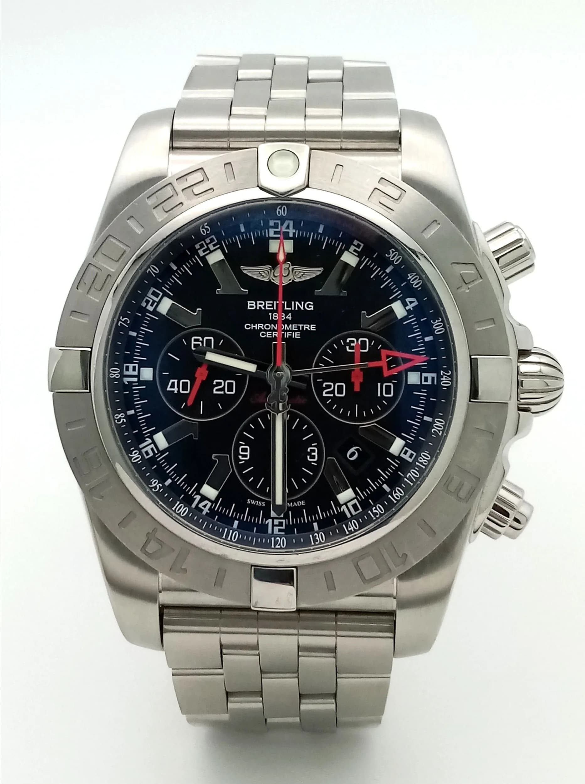 A Breitling Limited Edition Chronomat GMT Automatic Gents Watch. Model AB0412. Stainless steel bracelet and case - 47mm. Rotating bezel. Black dial with three sub dials. Comes with box and papers. In good condition and working order. Ref: 009648.