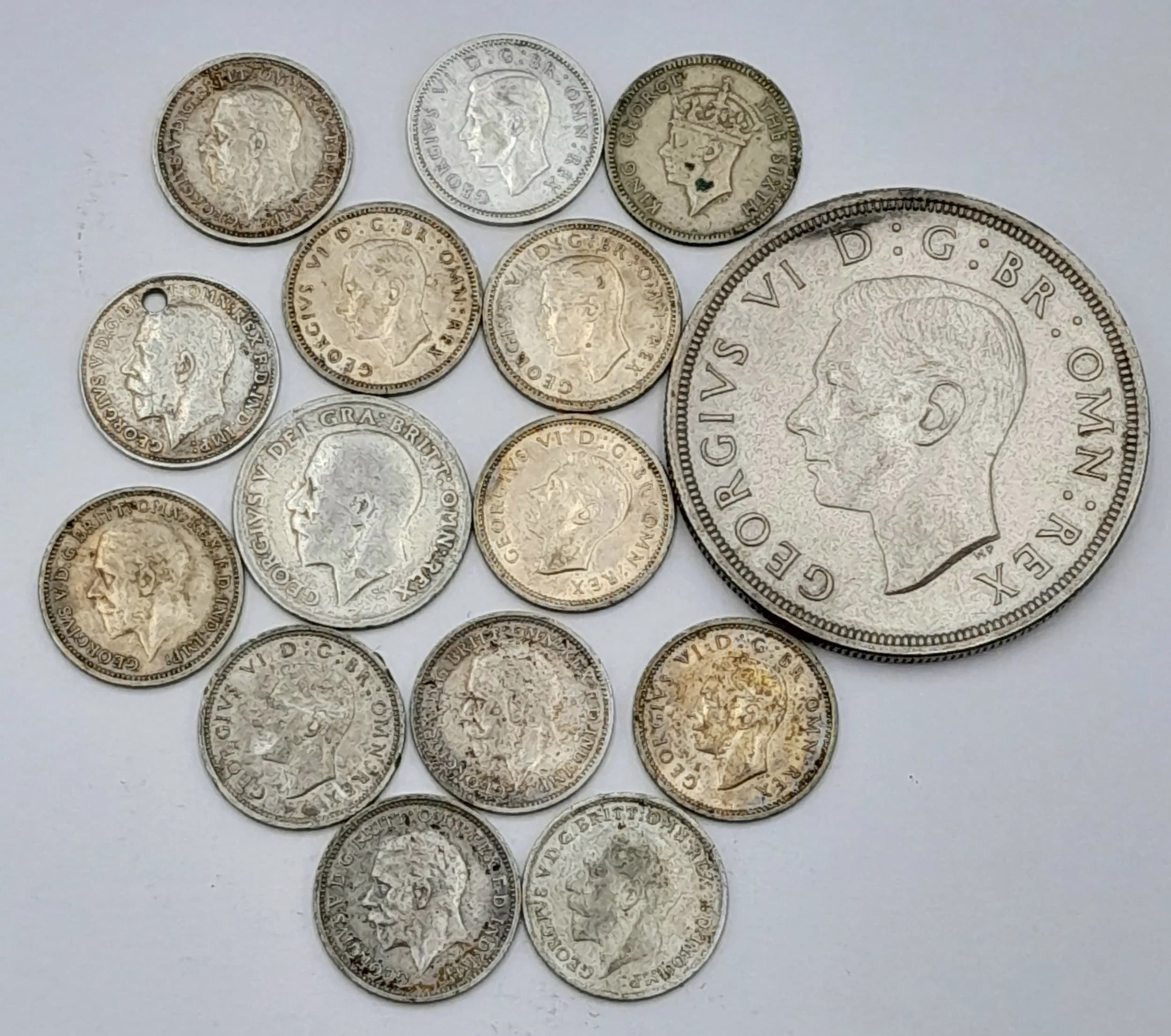 A Small Collection of Pre 1947 British Silver Coins. 42g.