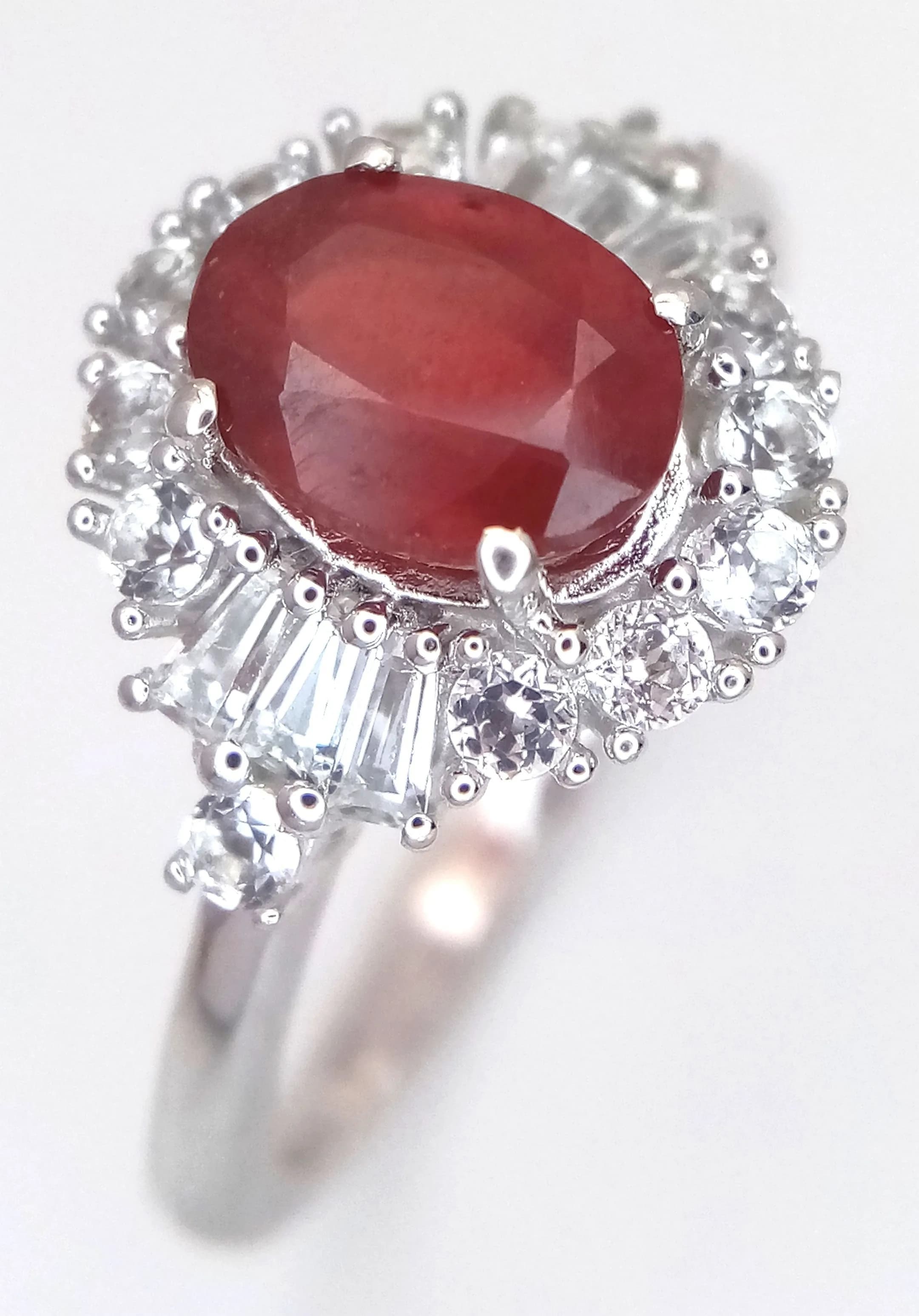 A Beautiful Sterling Silver Red and White Spinel Ring Size S. The Ring measures 1.3cm Length at the Crown and has a gross weight of 4.03 grams.
