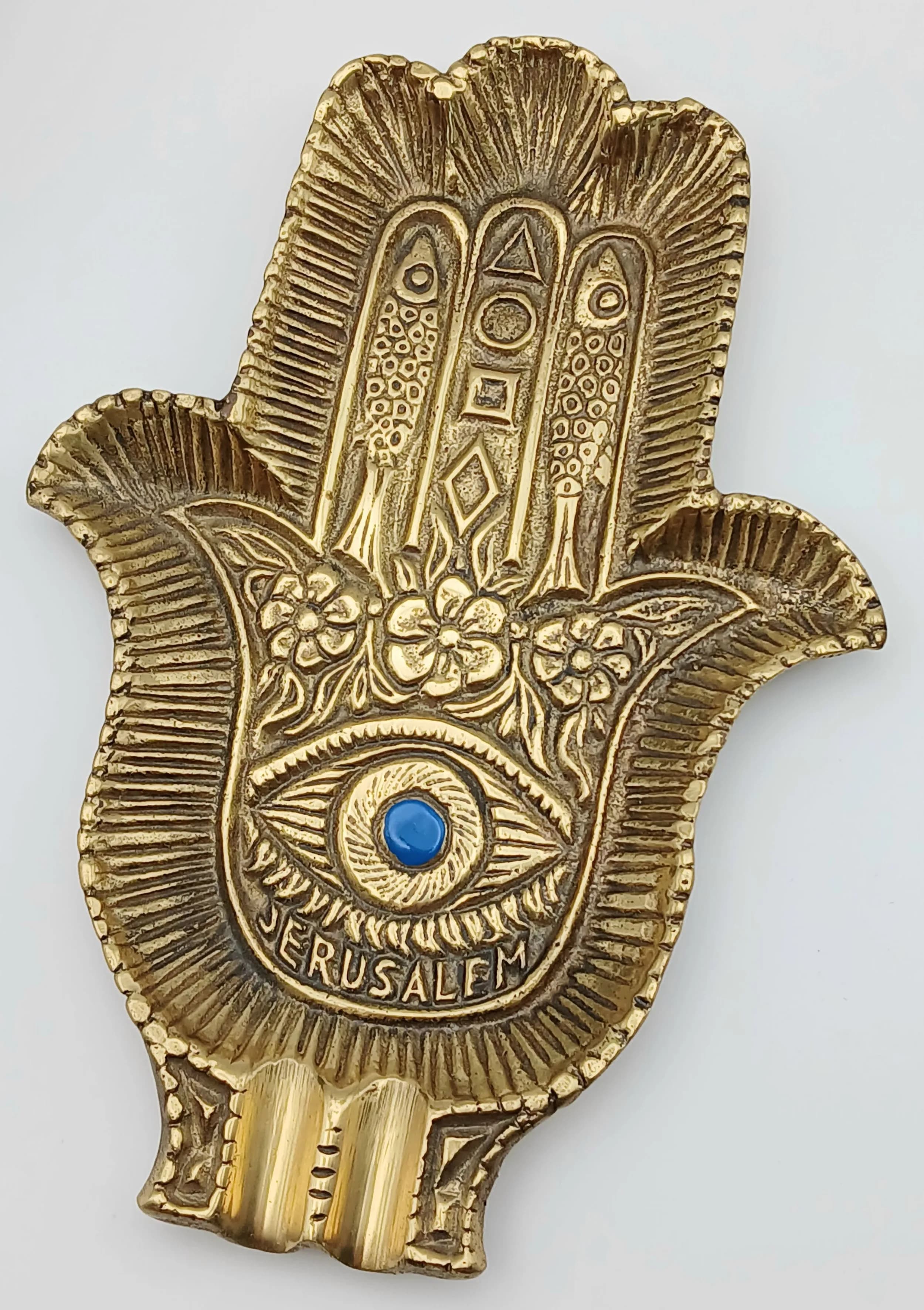 A Vintage Solid Brass Hamsa Ash-tray from Jerusalem - with an Evil Eye Motif. Tamar 295 marking. 15 x 10cm.