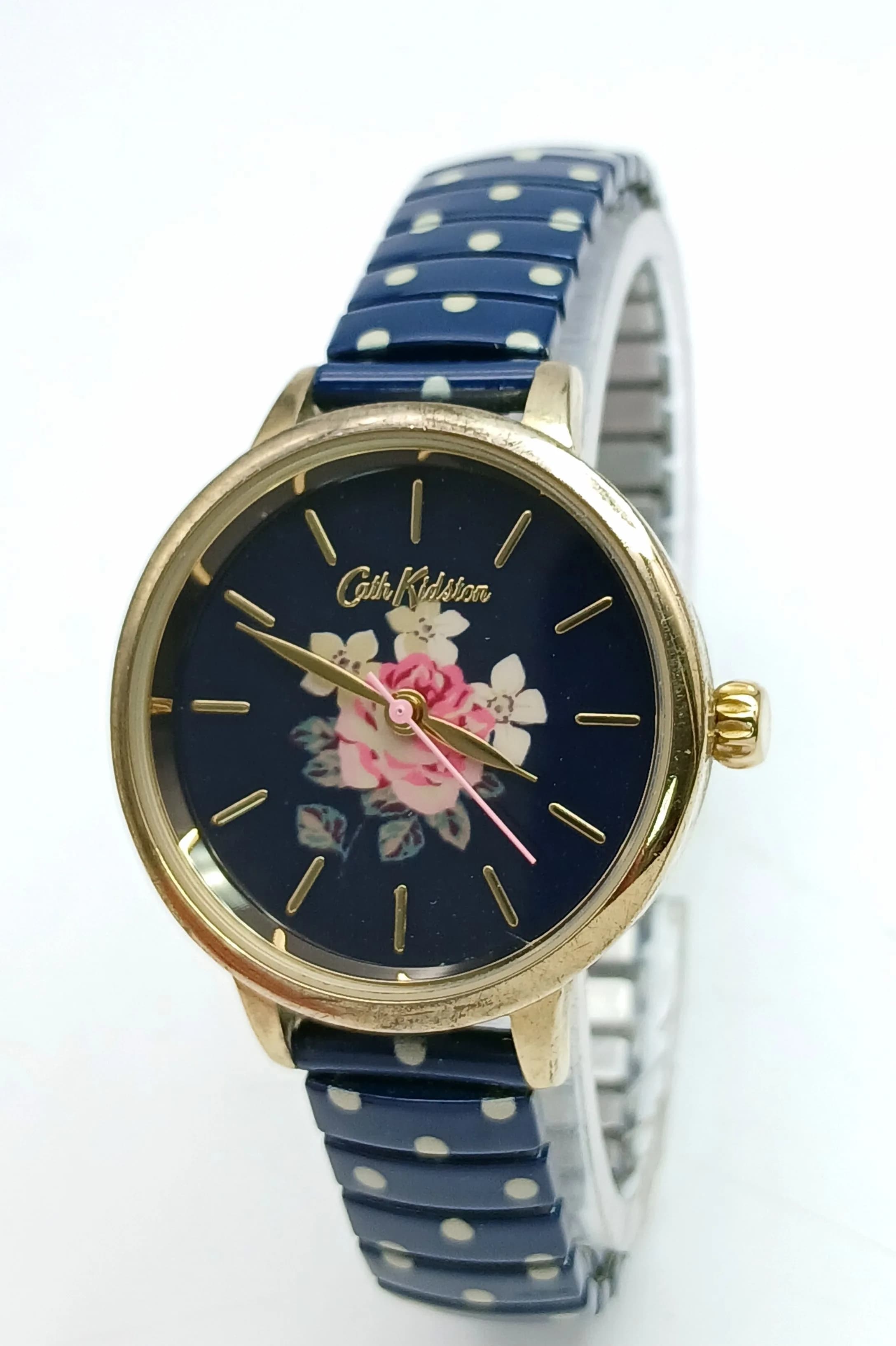 A CATH KIDSTON, FLOWER DESIGN, EXPANDING BRACELET WATCH. IN WORKING ORDER. NEW BATTERY FITTED RECENTLY. S/A 1650 - 2