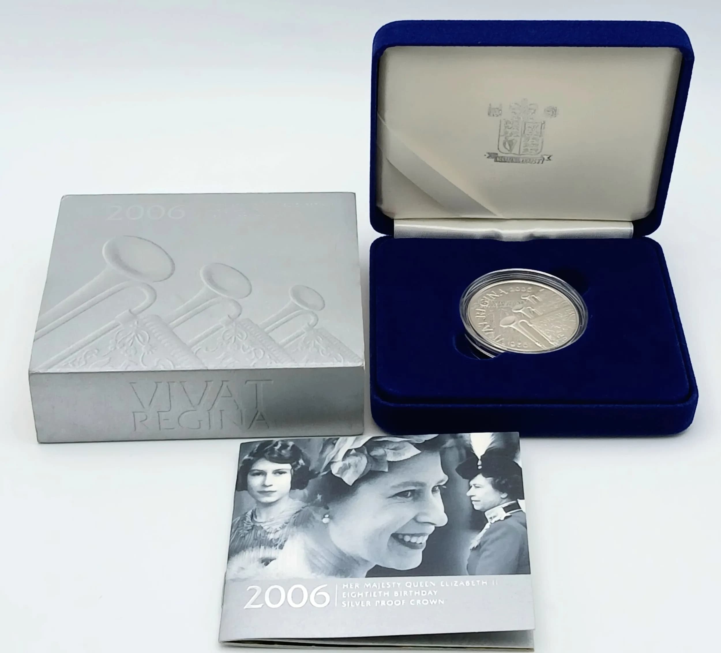 A 2006 Royal Mint Sterling Silver £5 Commemorative Coin Marking the 18th Birthday of Queen Elizabeth II. Proof quality, encapsulated. Comes with case and COA. 28.28g.