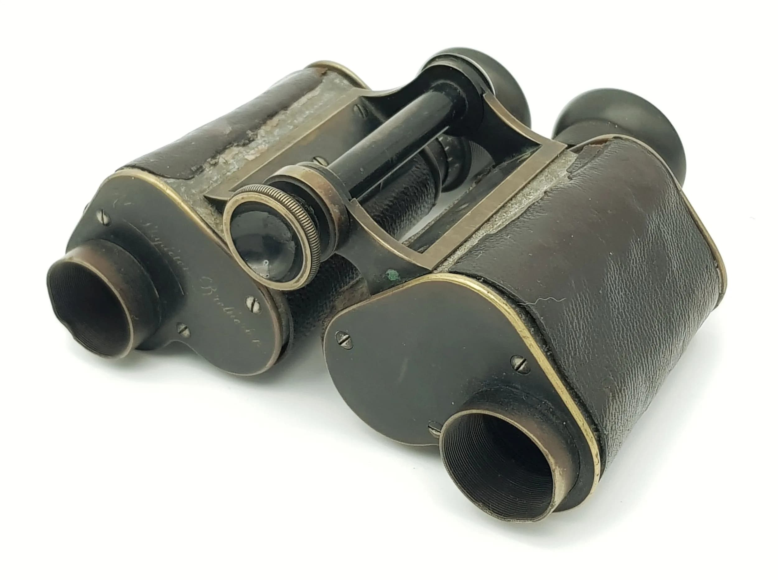 A PAIR OF BOER WAR BINOCULARS MADE BY E.KRAUSS & CLE PARIS CIRCA 1897 AND WERE OWNED BY LT. ROBERT STAPLETON-BRETHERTON WHO WAS KILLED IN ACTION IN 1902 AGED 26 .