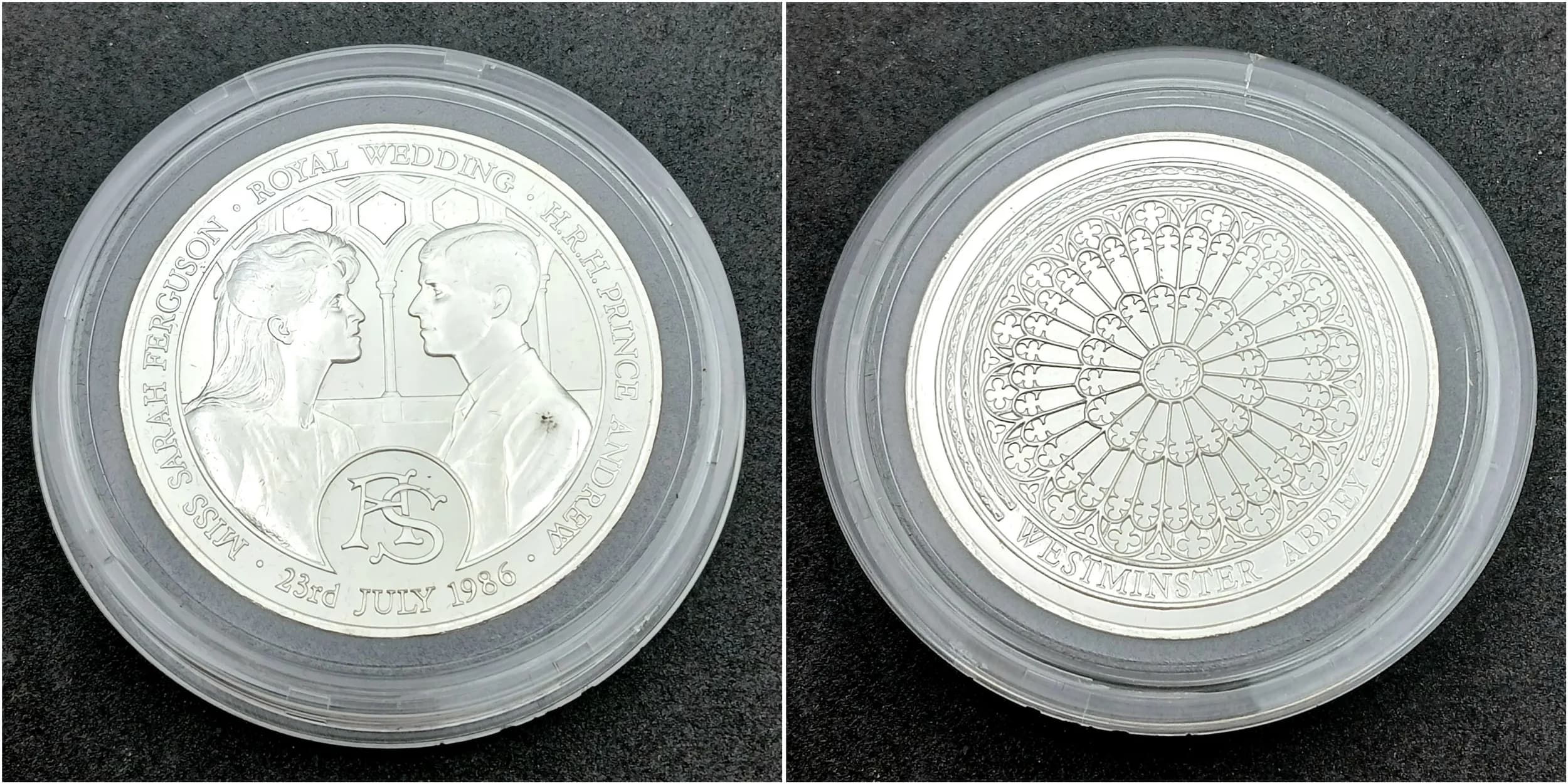 A 1986 Royal Mint Sterling Silver Proof Crown Commemorative Coin Marking the Wedding pf Prince Andrew and Sarah Ferguson. Encapsulated with case. 28.28g.