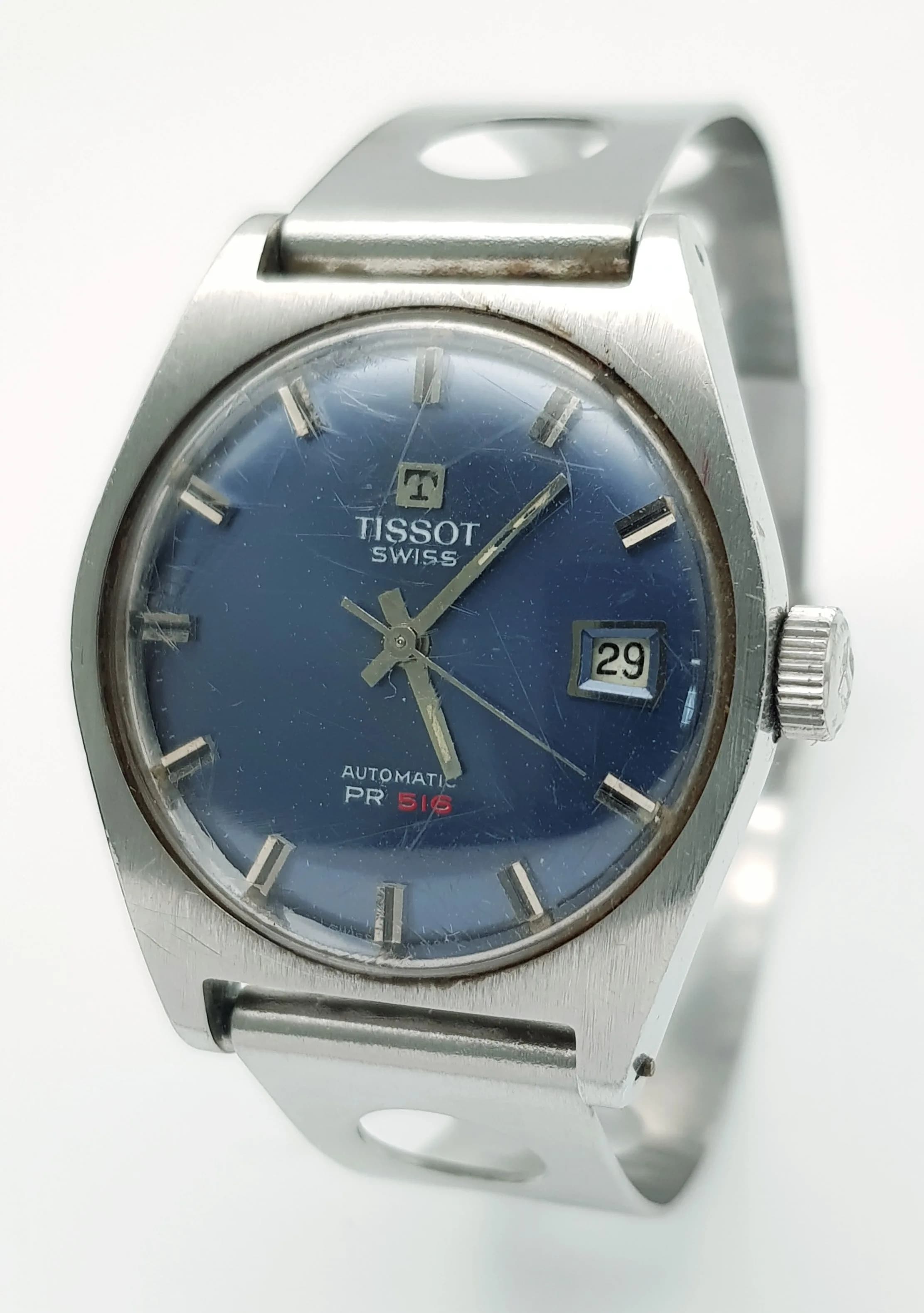 A Vintage Tissot Automatic PR 516 Gents Watch. Stainless steel bracelet and case - 34mm. Blue dial with date window. In working order.