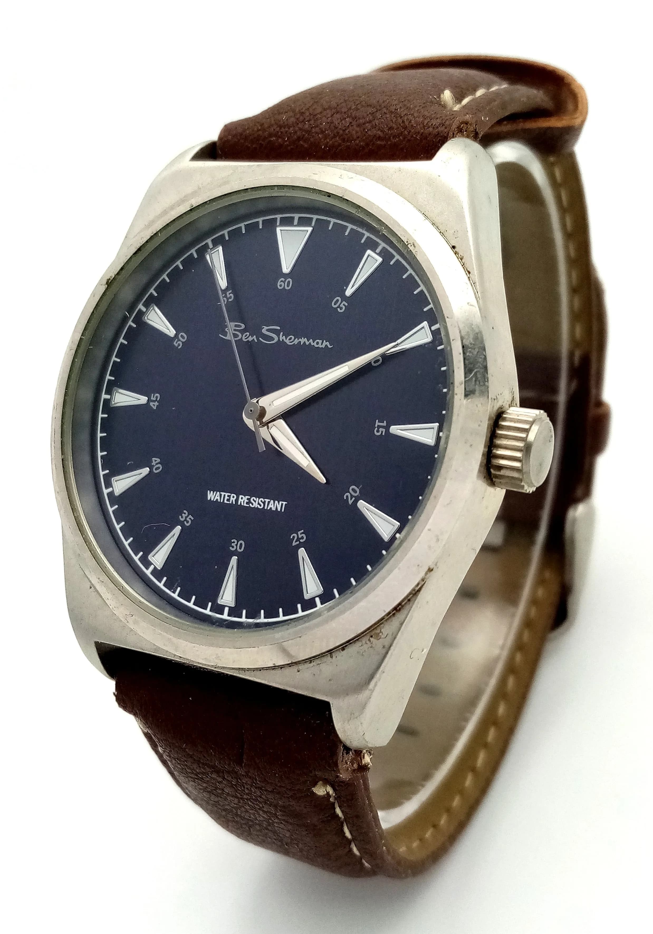 A BRAND NEW, BEN SHERMAN, BLUE DIAL, BROWN LEATHER STRAP WATCH. IN FULL WORKING ORDER. S/A 1324 - 3