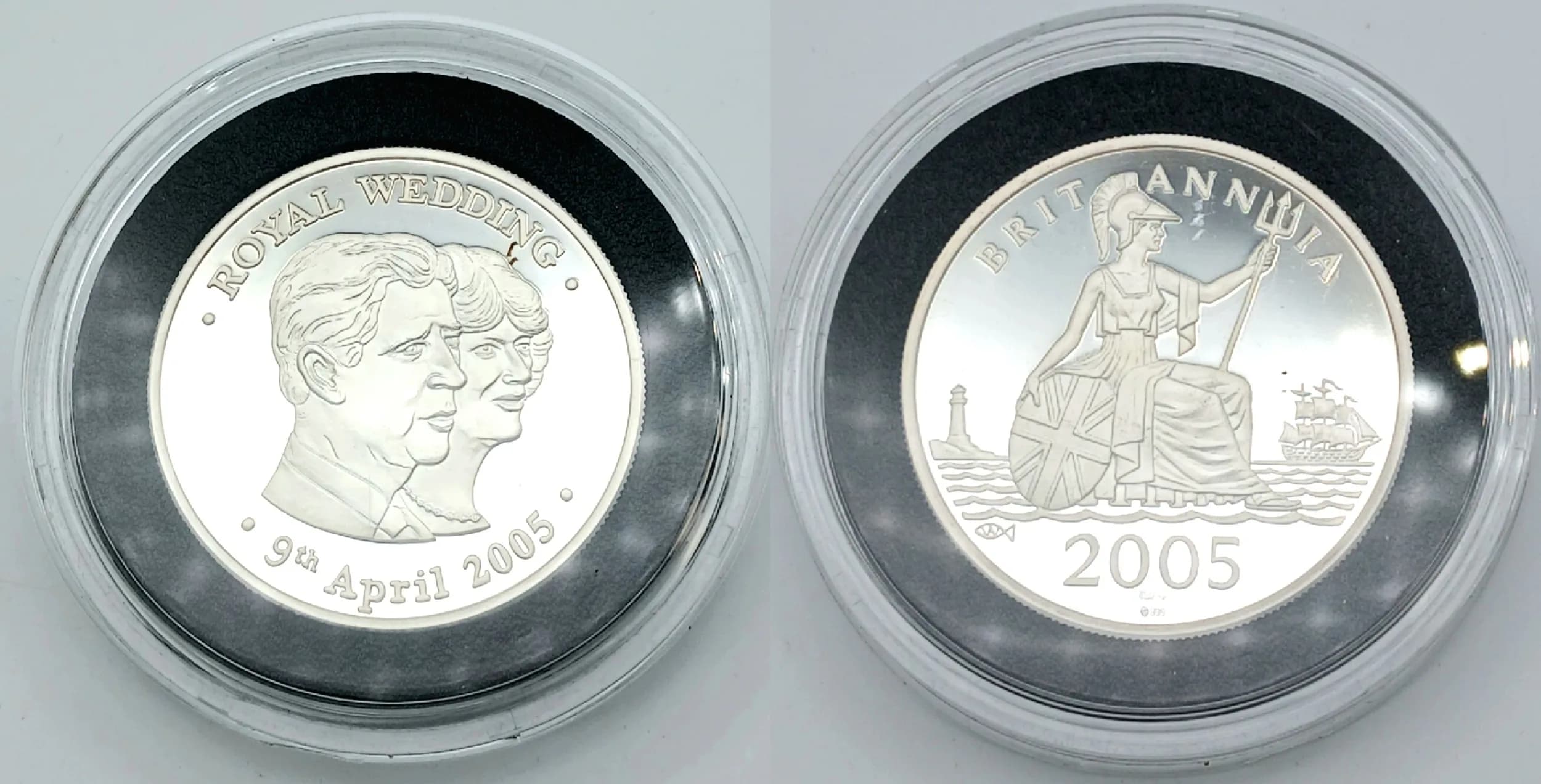 A 2005 Westminster Proof Commemorative 2oz Fine Silver (.999) Proof Coin. Marking the royal wedding of Charles and Camilla. Encapsulated with COA and Case. 50mm diameter. Only 2500 minted.