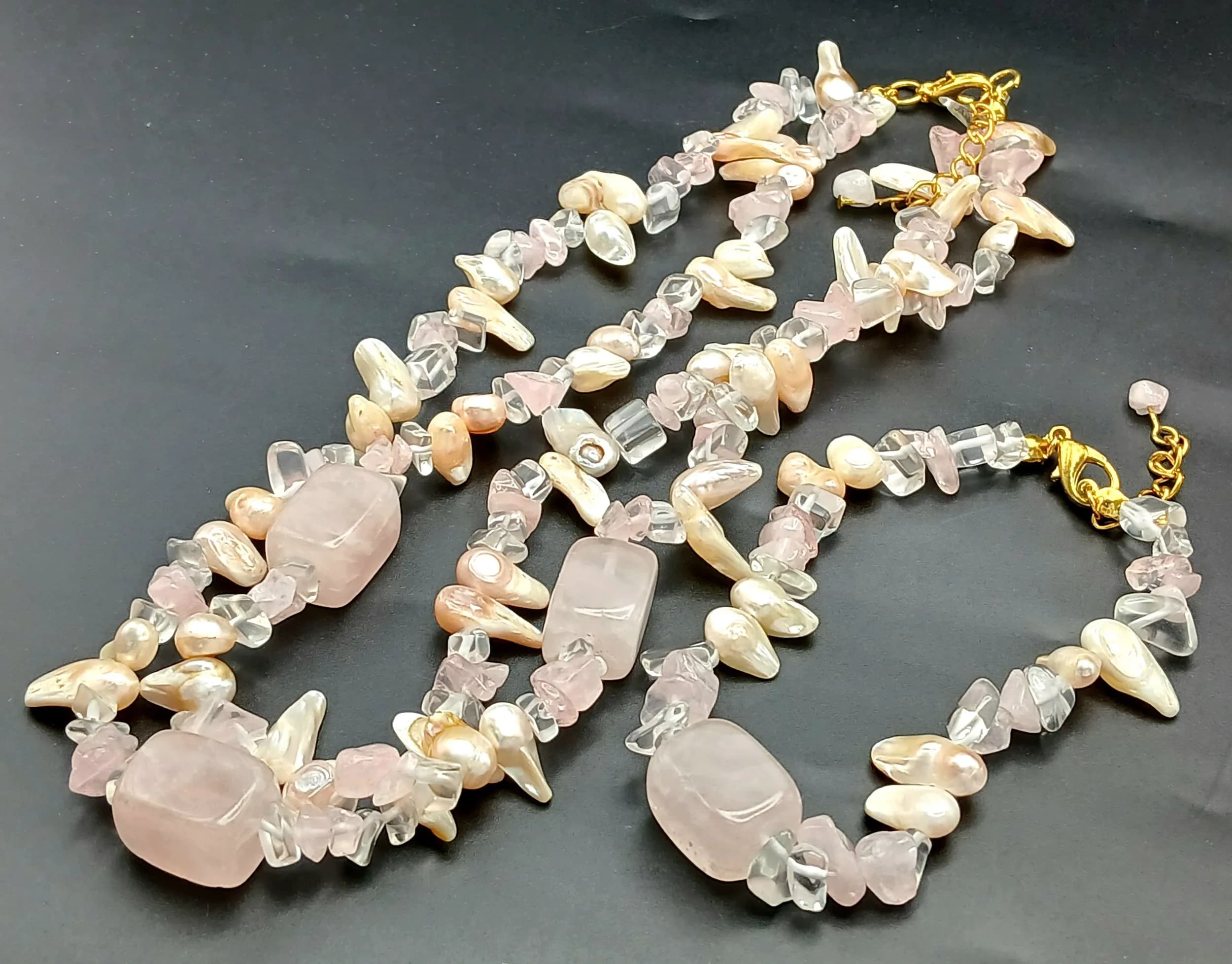 A Pretty Rose Quartz and Freshwater Pearl Necklace and Bracelet Set. Strung with rose quartz chip beads, irregular freshwater pearls and polished rectangular rose quartz beads, with gold-tone clasps. The necklace measures 36cm length. The bracelet measures 16cm length.