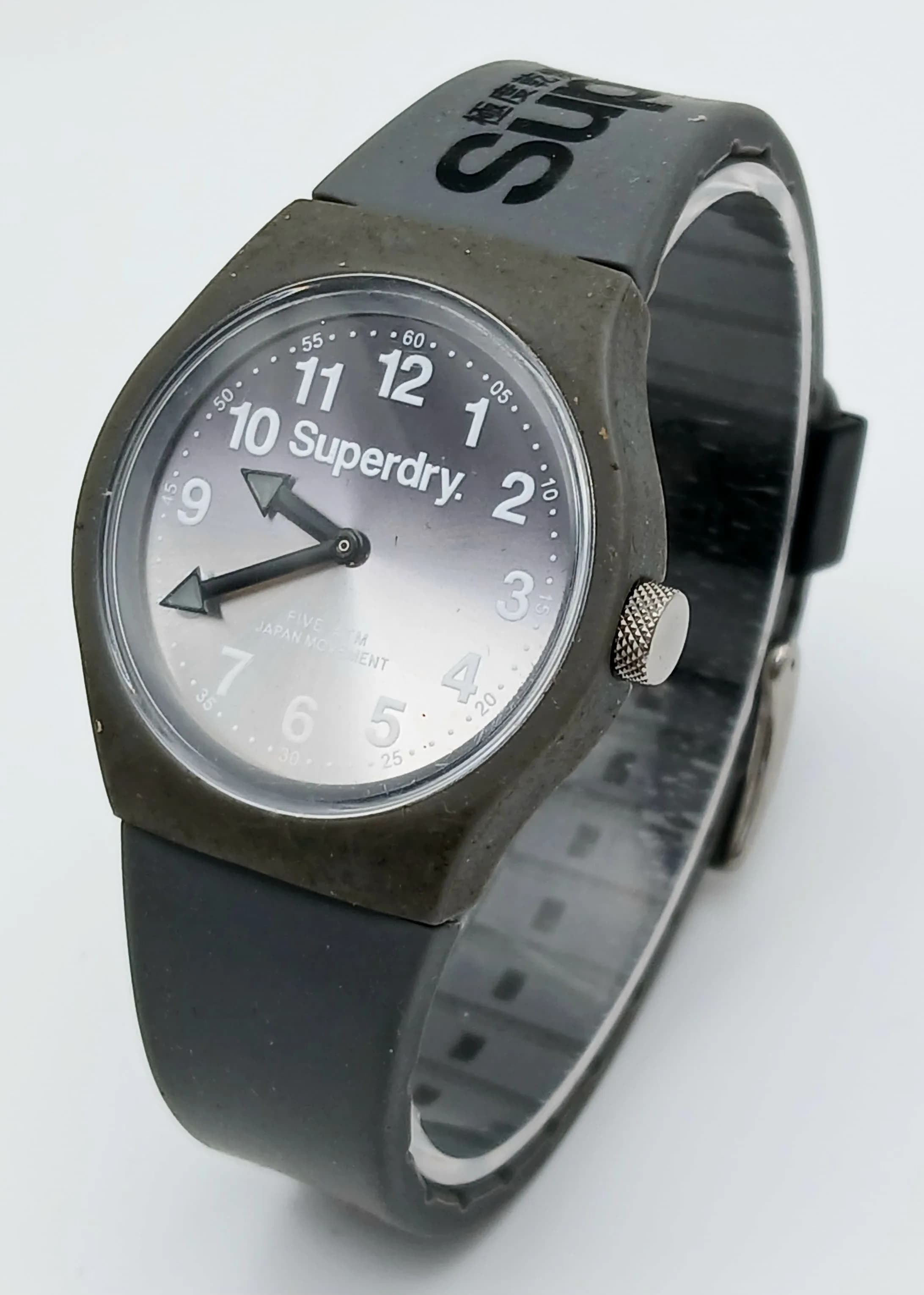 A SUPERDRY, GREY RUBBER STRAP WATCH. IN FULL WORKING ORDER. S/A 1649 - 1