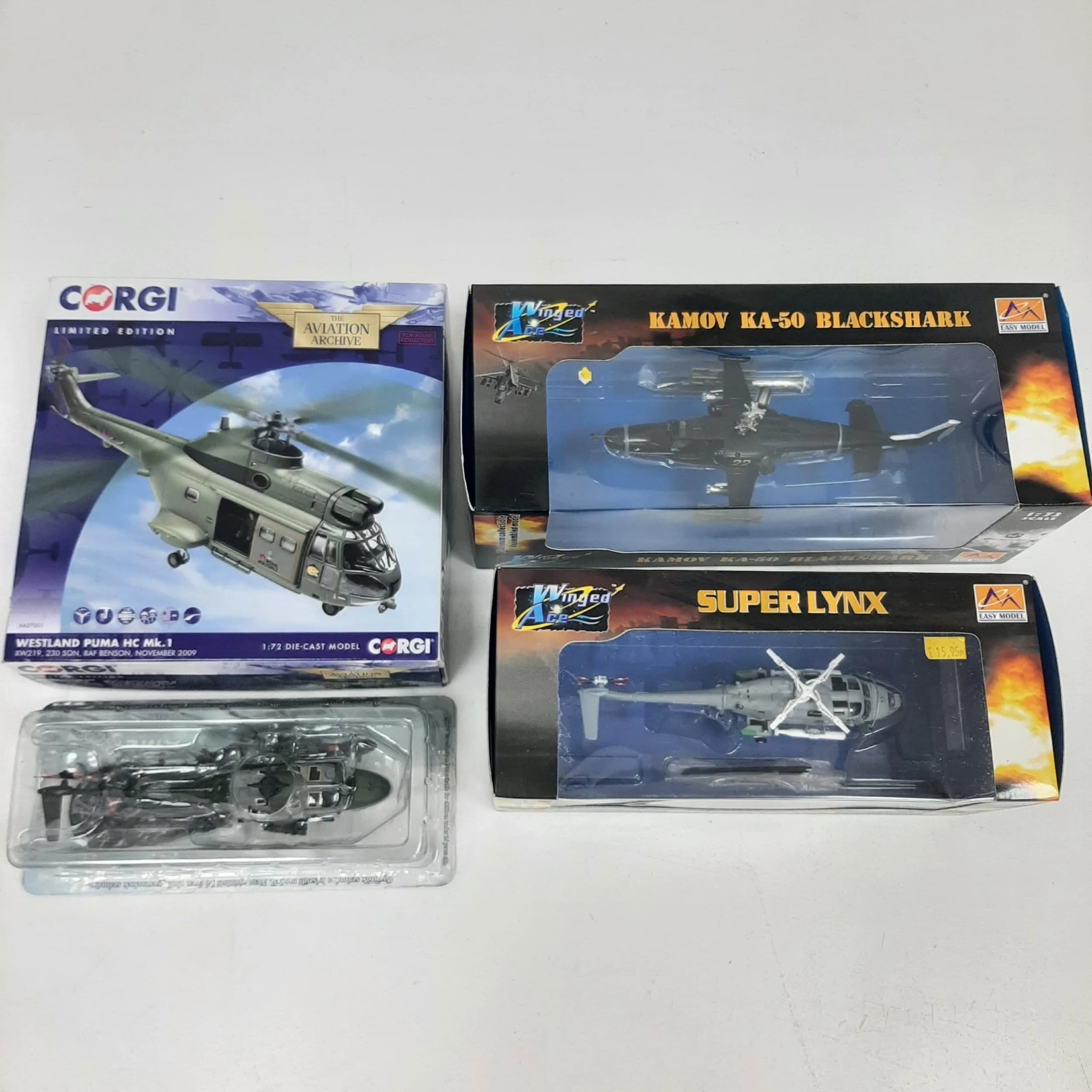 Four die cast Helicopter models. 1/72 scale. Including a Corgi Archive Westland Puma HC MK1. These have never been out of box on display. Good condition.