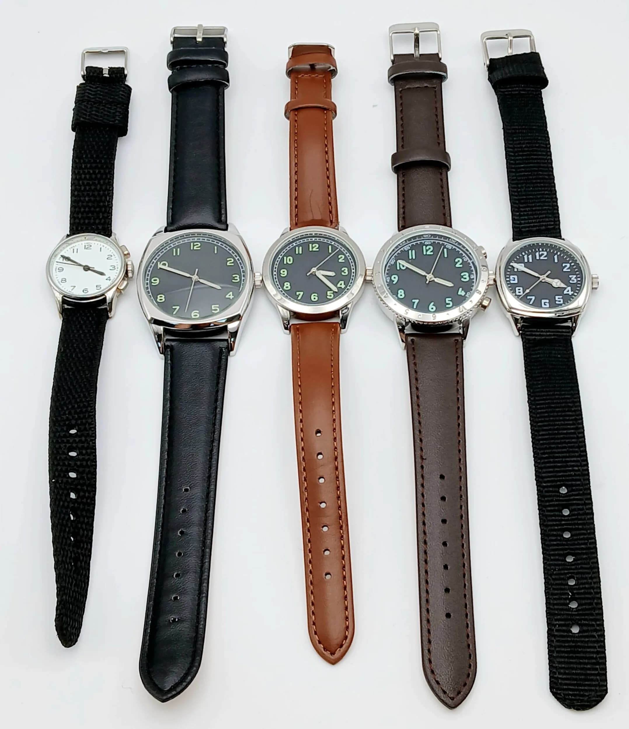 A Parcel of Five Military Design Watches.. Comprising: 1) 1940’s Design German Soldier-34mm case, 2) 1970’s Design French Airman-37mm case, 3) 1940’s Design Czech Army-38mm case, 4) 1920’s Design United States Soldier-31mm case and 5) 1940’s Design United States Women’s Airforce-26mm case. All have had replacement batteries in July 2026.