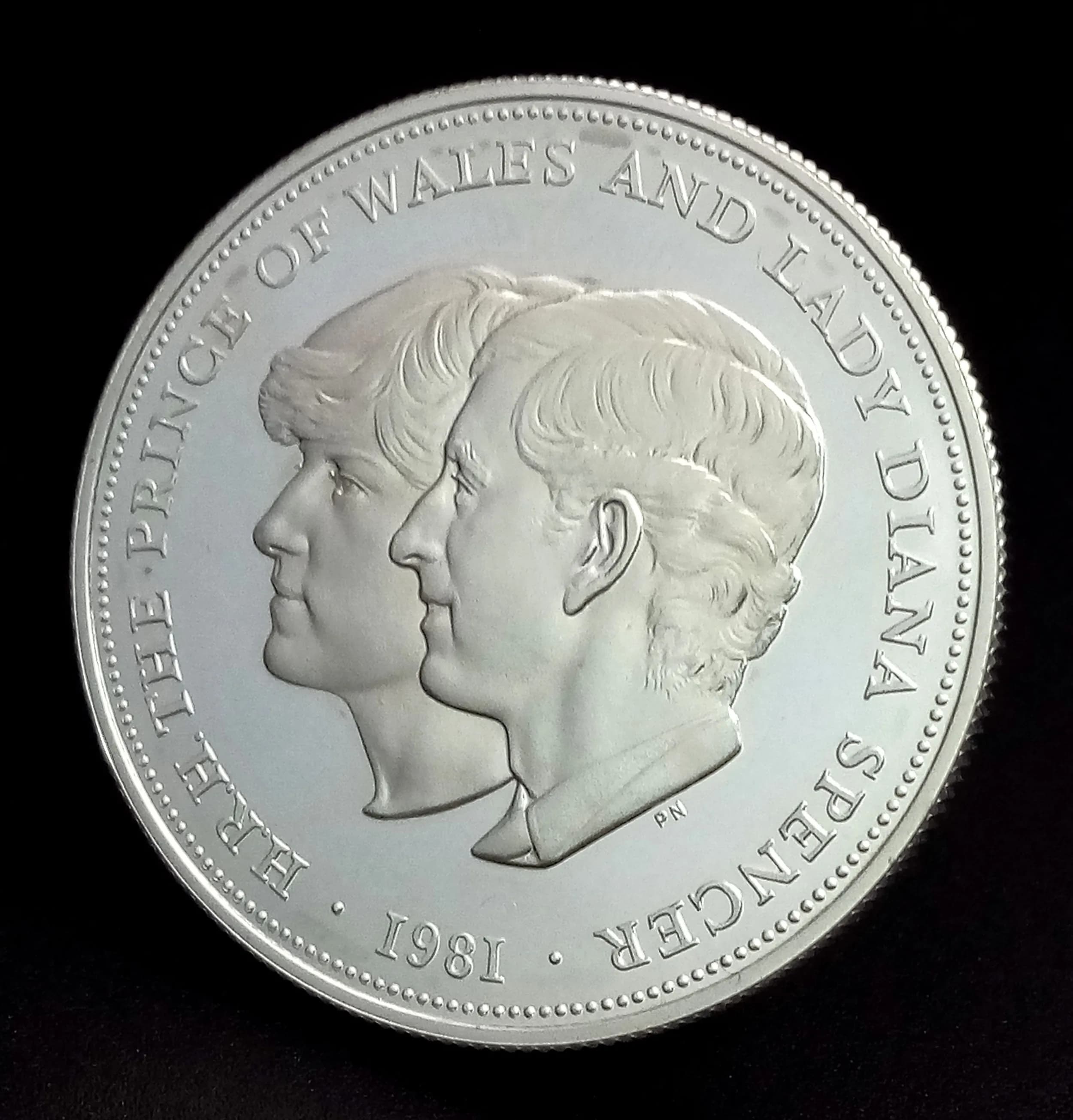 A 1981 Royal Mint Sterling Silver Proof £5 Commemorative Coin - Marking the Wedding of Prince Charles and Diana Spencer. Encapsulated with case and COA. 28.28g.