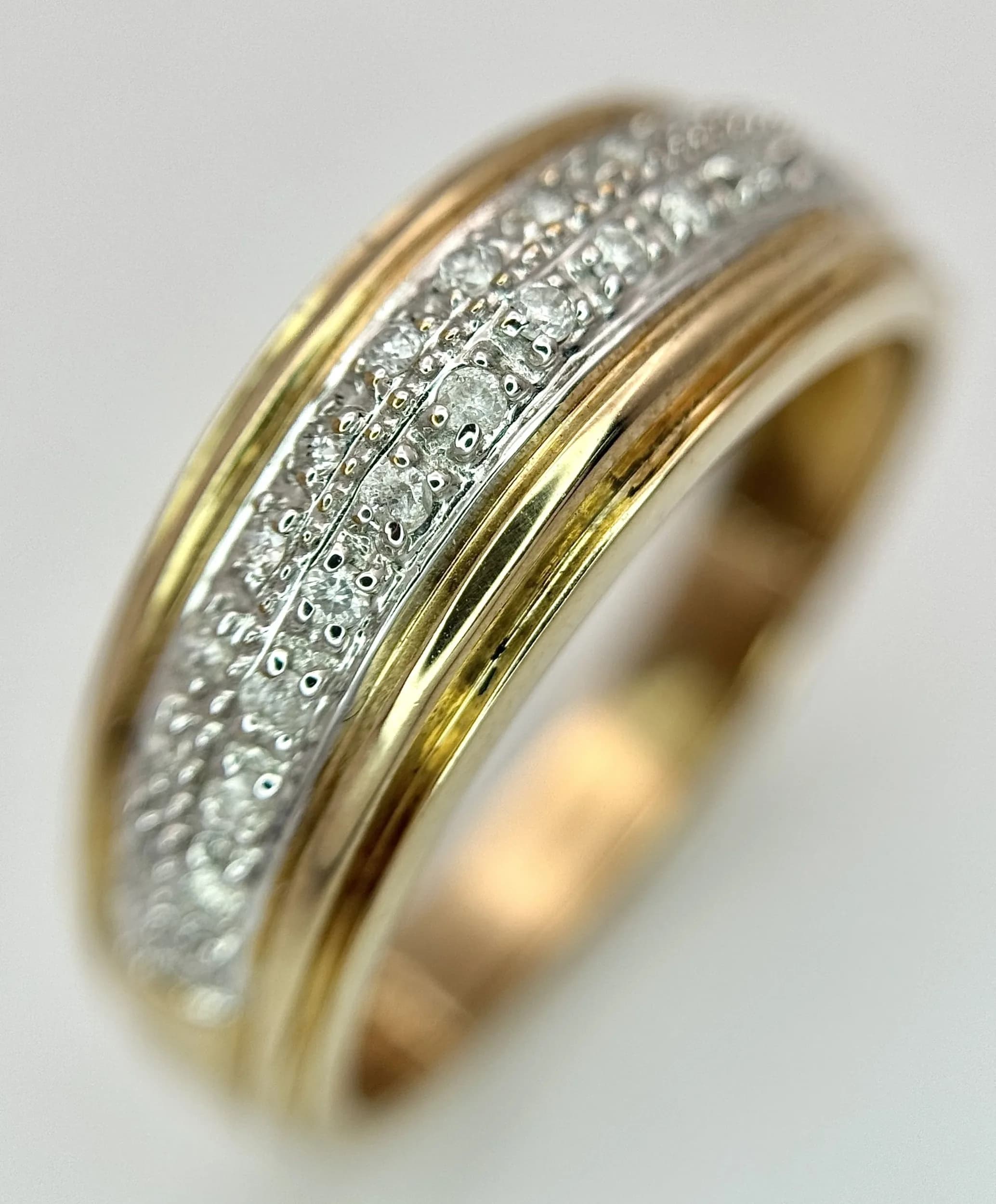 A 9K yellow gold diamond 2 row ring, 0.13ct diamond weight, 3.3g total weight, ring size U. Ref: SH9545H