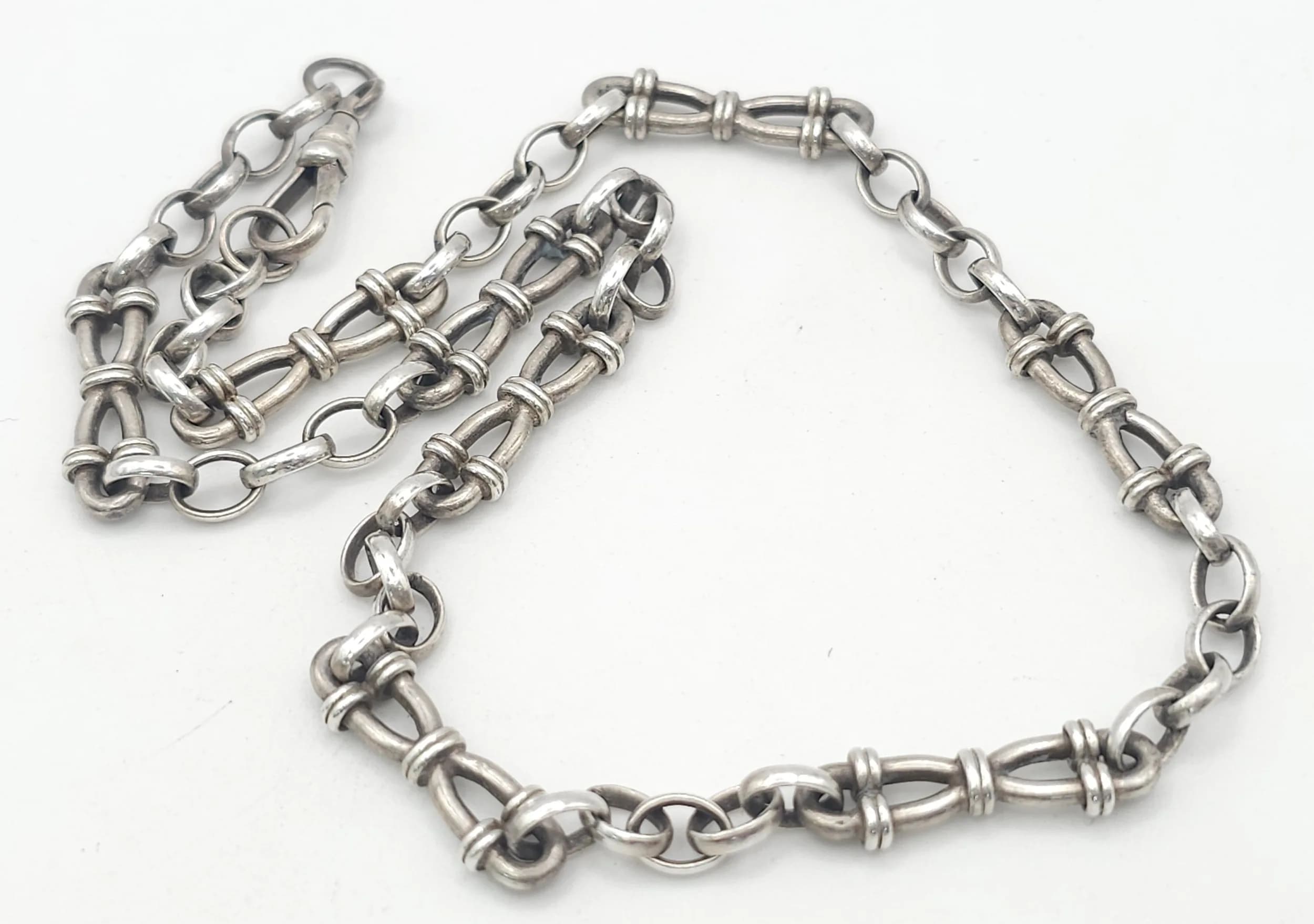 A VERY INTERESTING SILVER MULTI LINK NECK CHAIN . 31 8gms 44cms