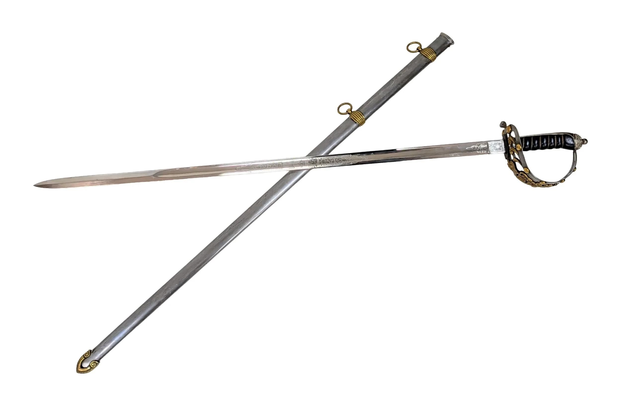 A Reproduction 1865 Victorian 1st Life Guards State Sword. Steel guard with brass cypher. Black leather grip with inlaid wire. Steel scabbard with brass hanging rings. Engraved blade. Steel back-plate and textured pommel. 120cm total length. UK Mainland Shipping Only or arrange a courier service.