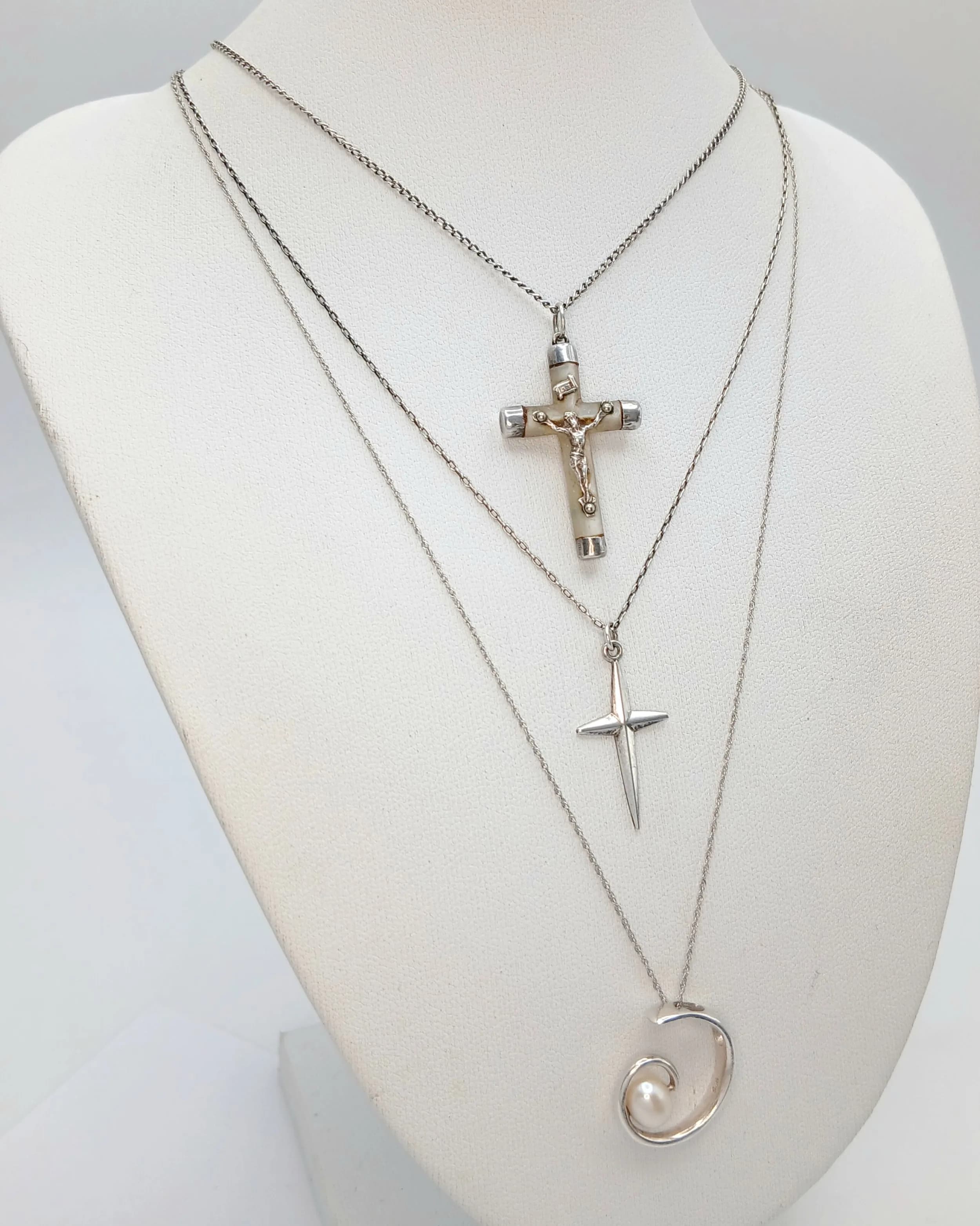 Three Sterling Silver Chains all with Different Style Pendants.44-50cm chains. 7.9g total weight.