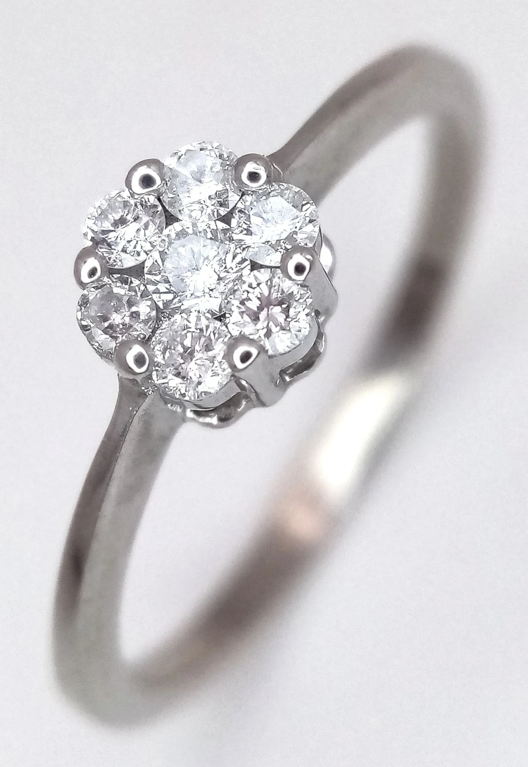 A 9K WHITE GOLD, DIAMOND SET RING. 0.25CTW. 1.8G, SIZE Q. SC 6031