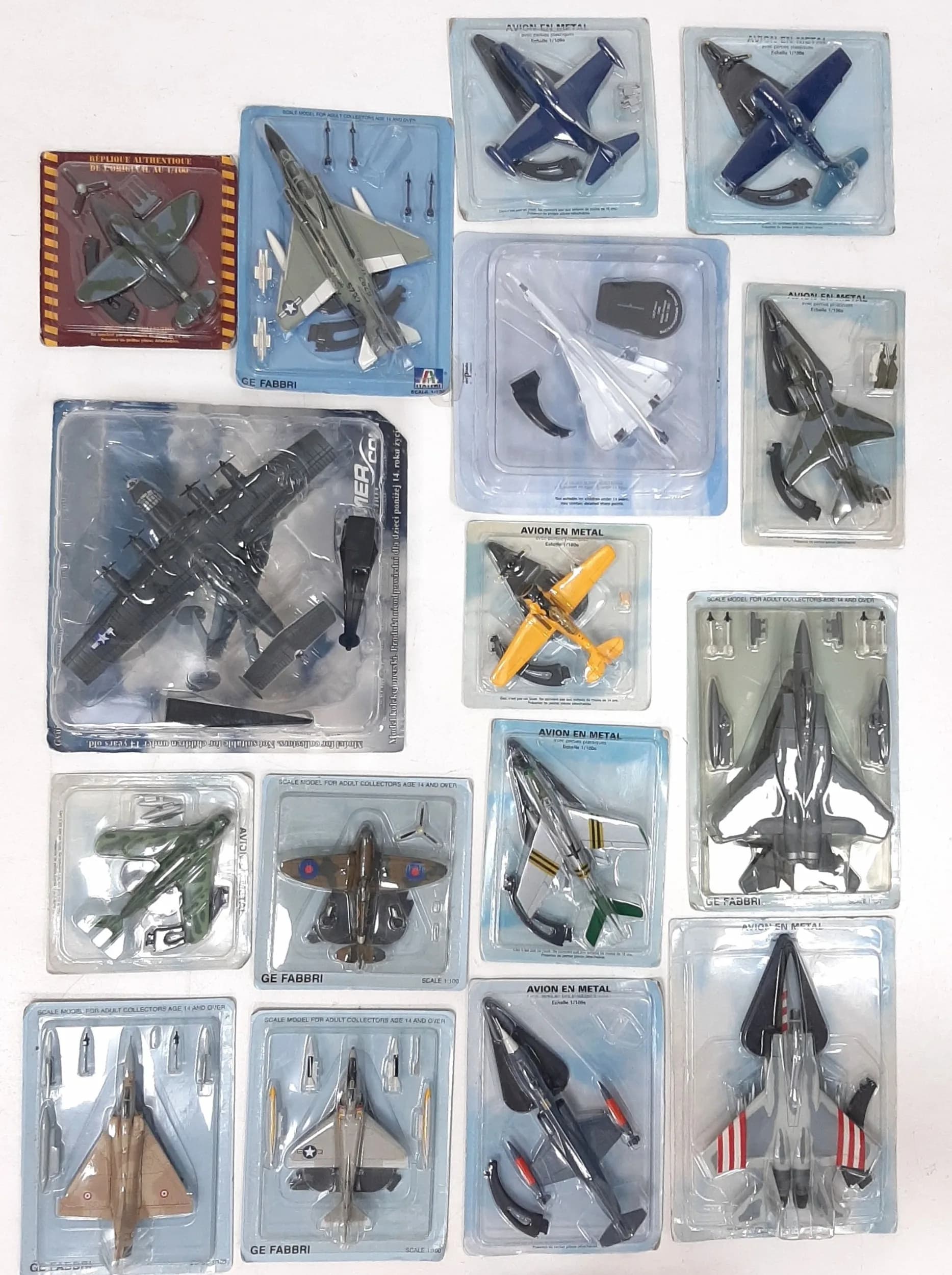 Sixteen die cast model aeroplanes. Various makes and scales. All still sealed on their blister packs. Good condition.