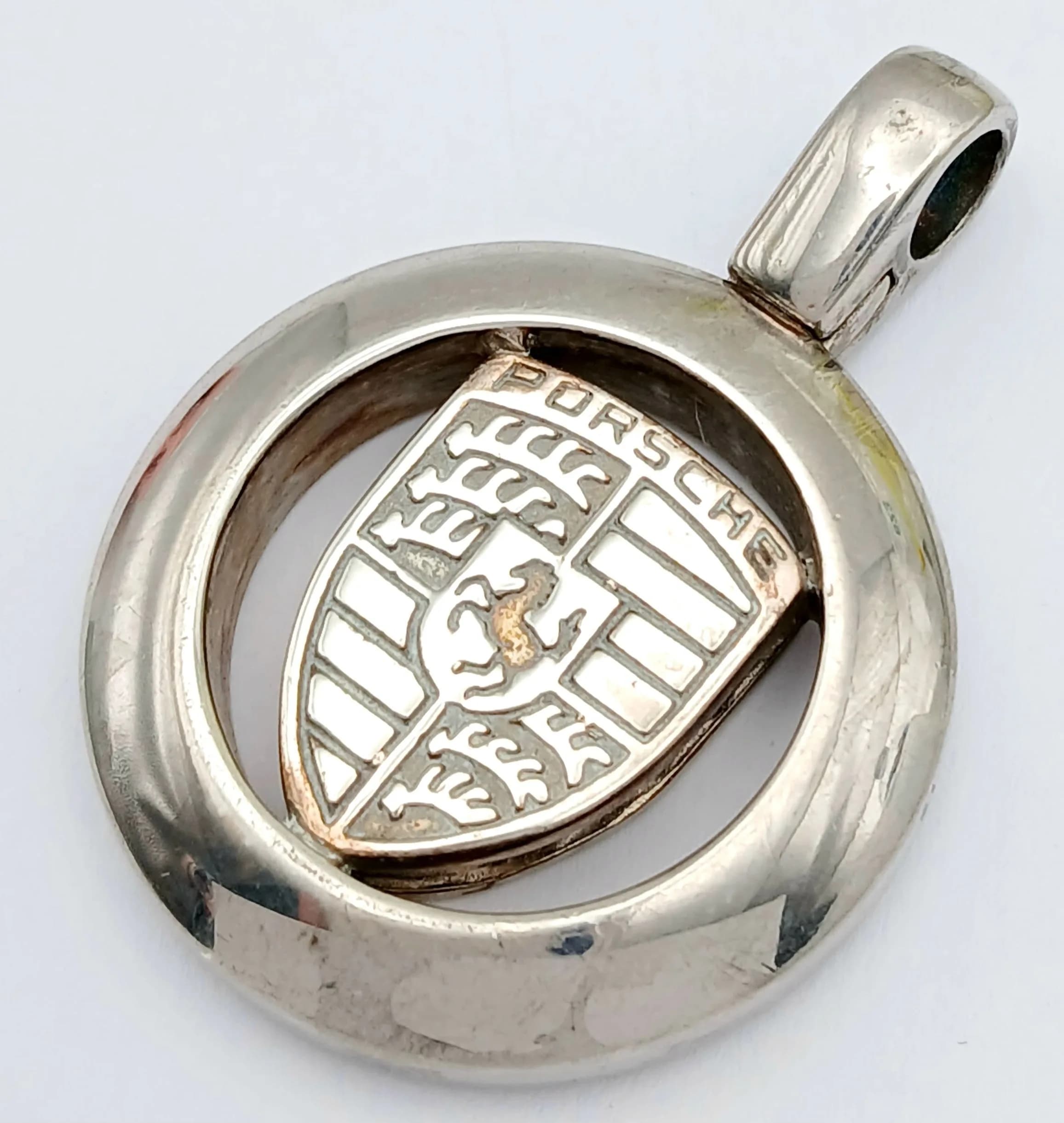 A STERLING SILVER, PORSCHE, PENDANT FOR CHAIN OR KEYRING. 26.4G. 8428