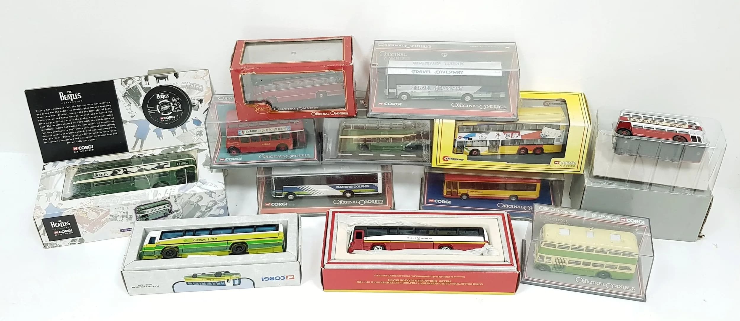 Twelve Corgi die cast Bus models. 1/50 scale. Good condition.