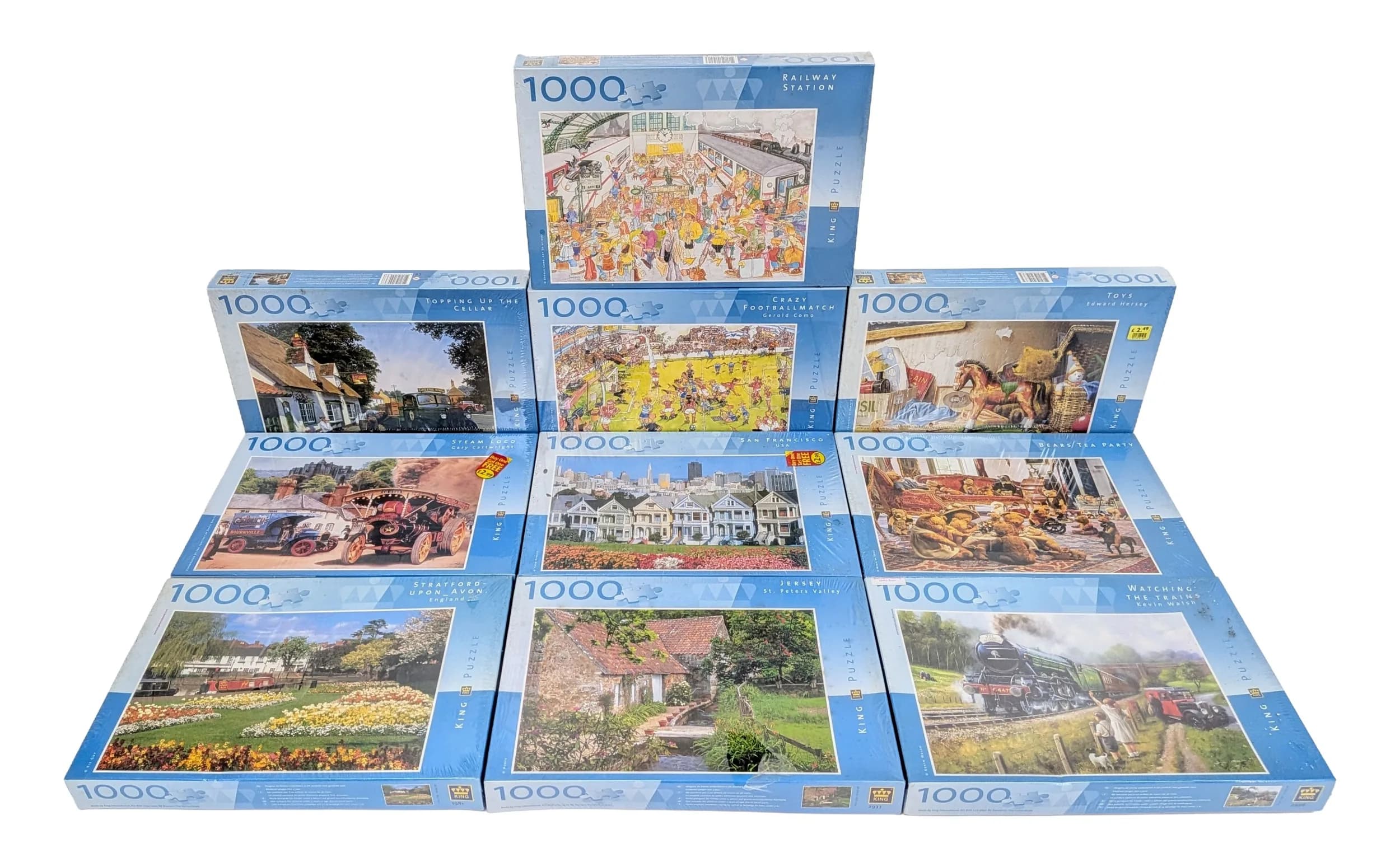 A Collection of Ten King Puzzle 1000 Piece Jigsaw Puzzles. Each boxed and sealed, comprising assorted scenic and novelty designs.