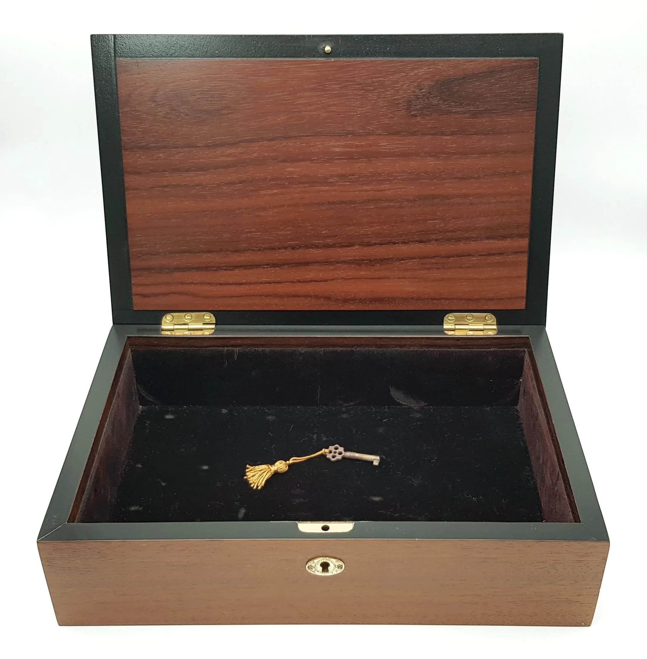 A Vintage Wooden Chest. Velvet lined. 30.5cm length x 20cm width x 8.5cm height. Comes with key.