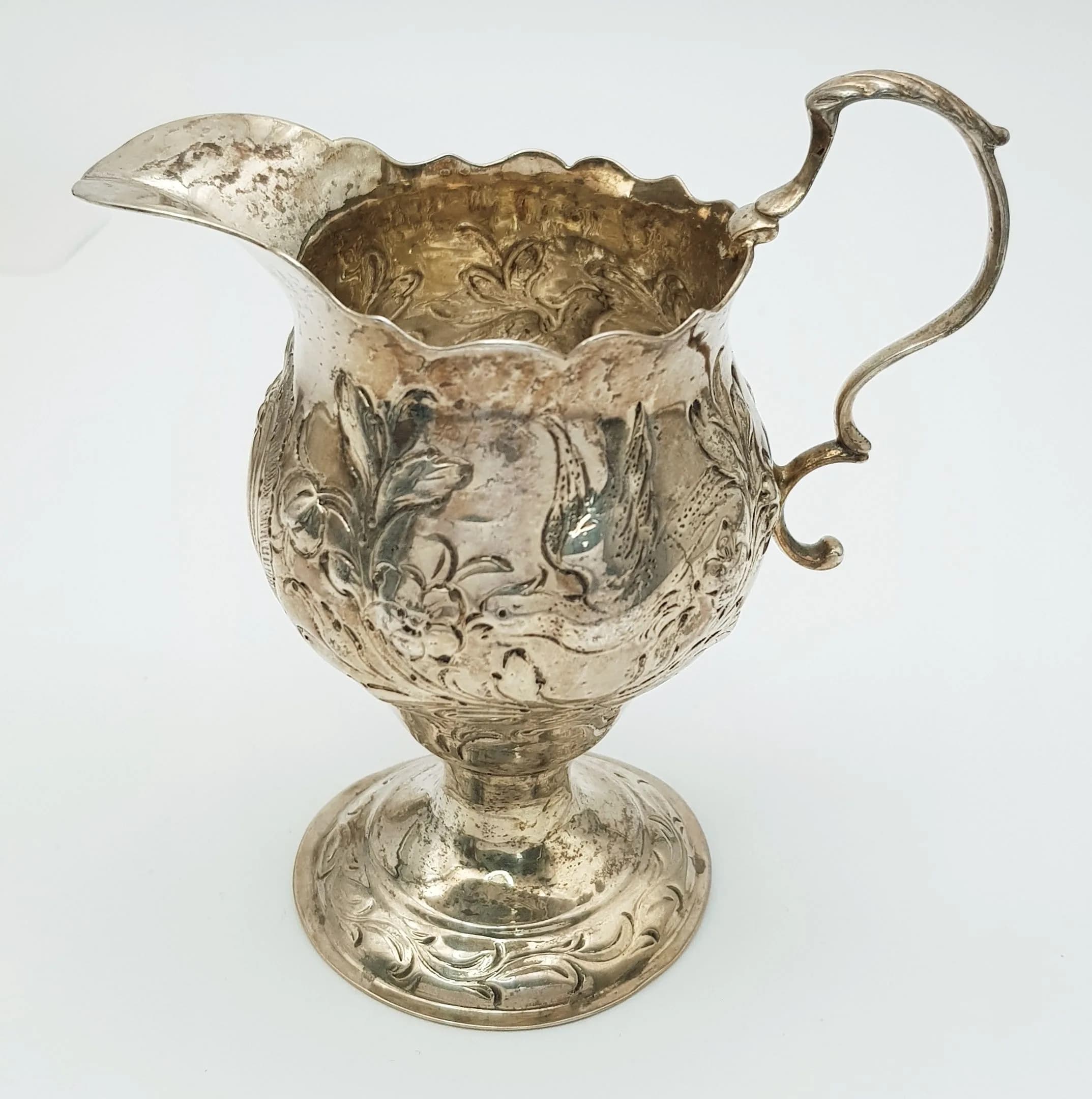 A Rare Antique Georgian, Ann Smith and Nathaniel Appleton Creamer Jug Featuring Repoussé and Chase Work. Hallmarks or London 1776. 10.5cm tall. 77.2g