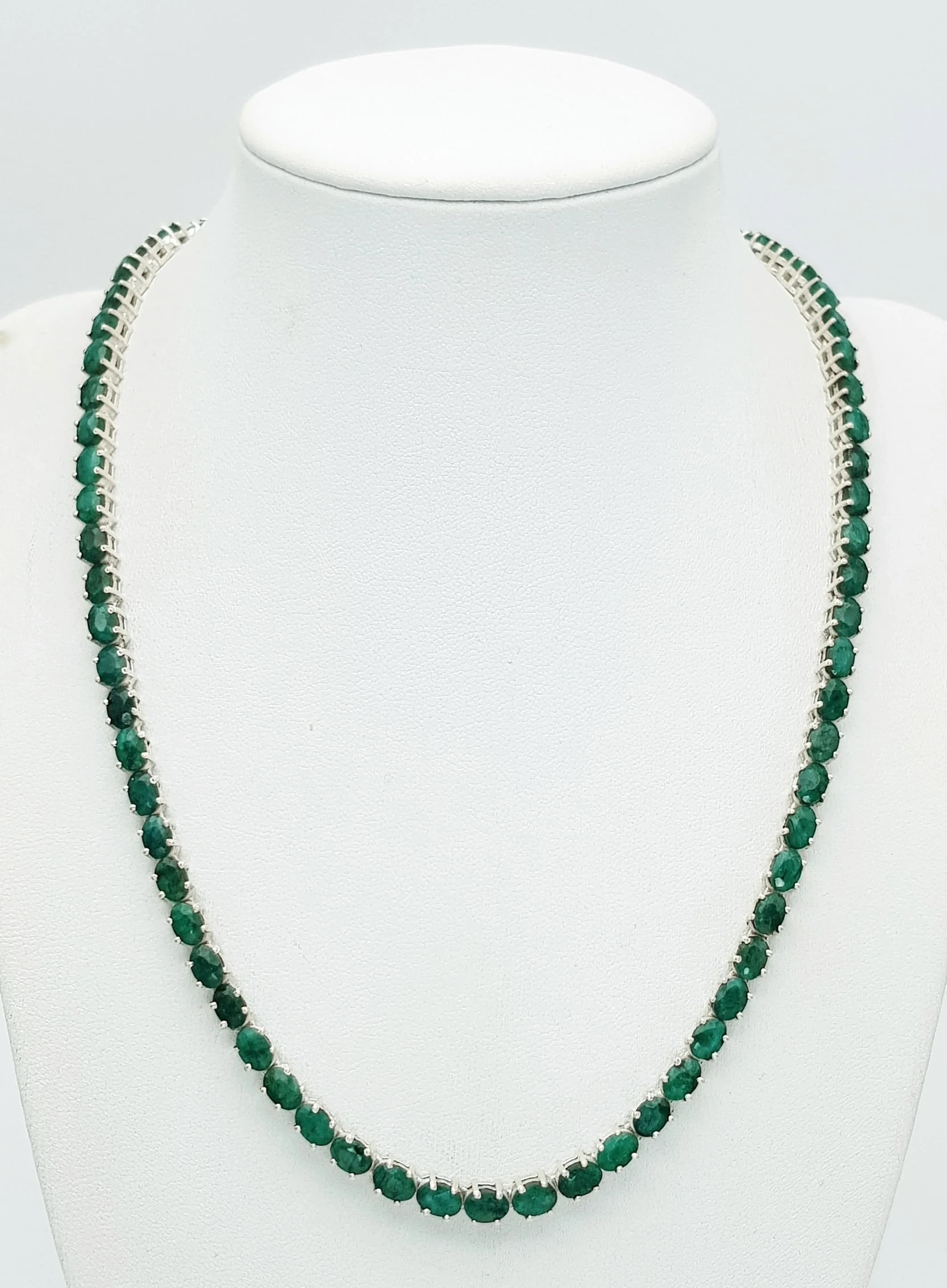 An Emerald Gemstone Tennis Necklace. Set in 925 Silver. 45cm length. 35g total weight. CD-2131.