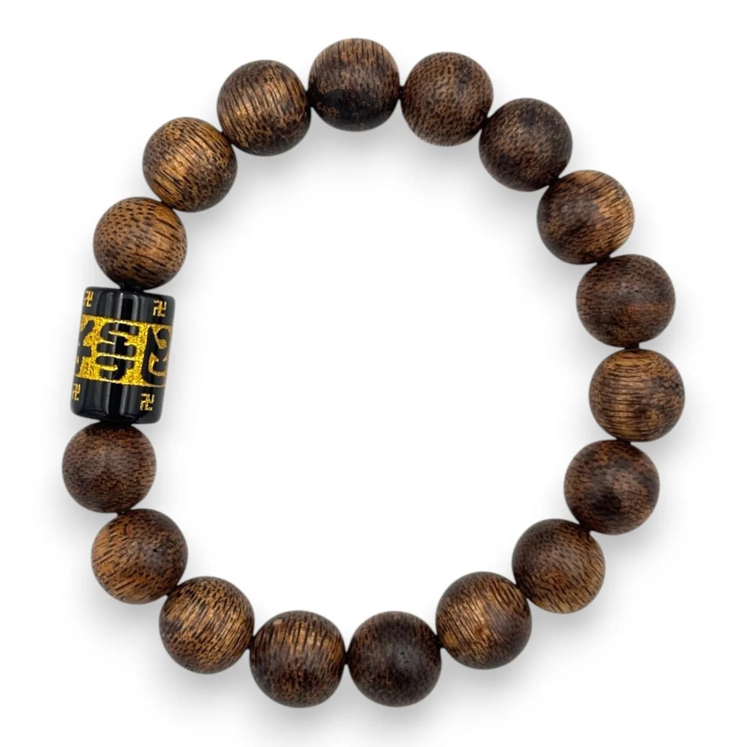 A natural Agarwood Beaded praying Bracelet with Black and Gold-Toned Accent mantra Bead.The natural agarwood fragrance is well known for its purposes in relaxation and meditation.Good condition with natural variations to the agarwood. Approximately 18cm inner circumference, beads 1cm diameter. Please see photos or request a condition report.This item is held at Cadmore ASIAN Office in Vietnam and will be shipped from there. Buyers will be responsible for direct shipping payments. Delivery will take slightly longer.