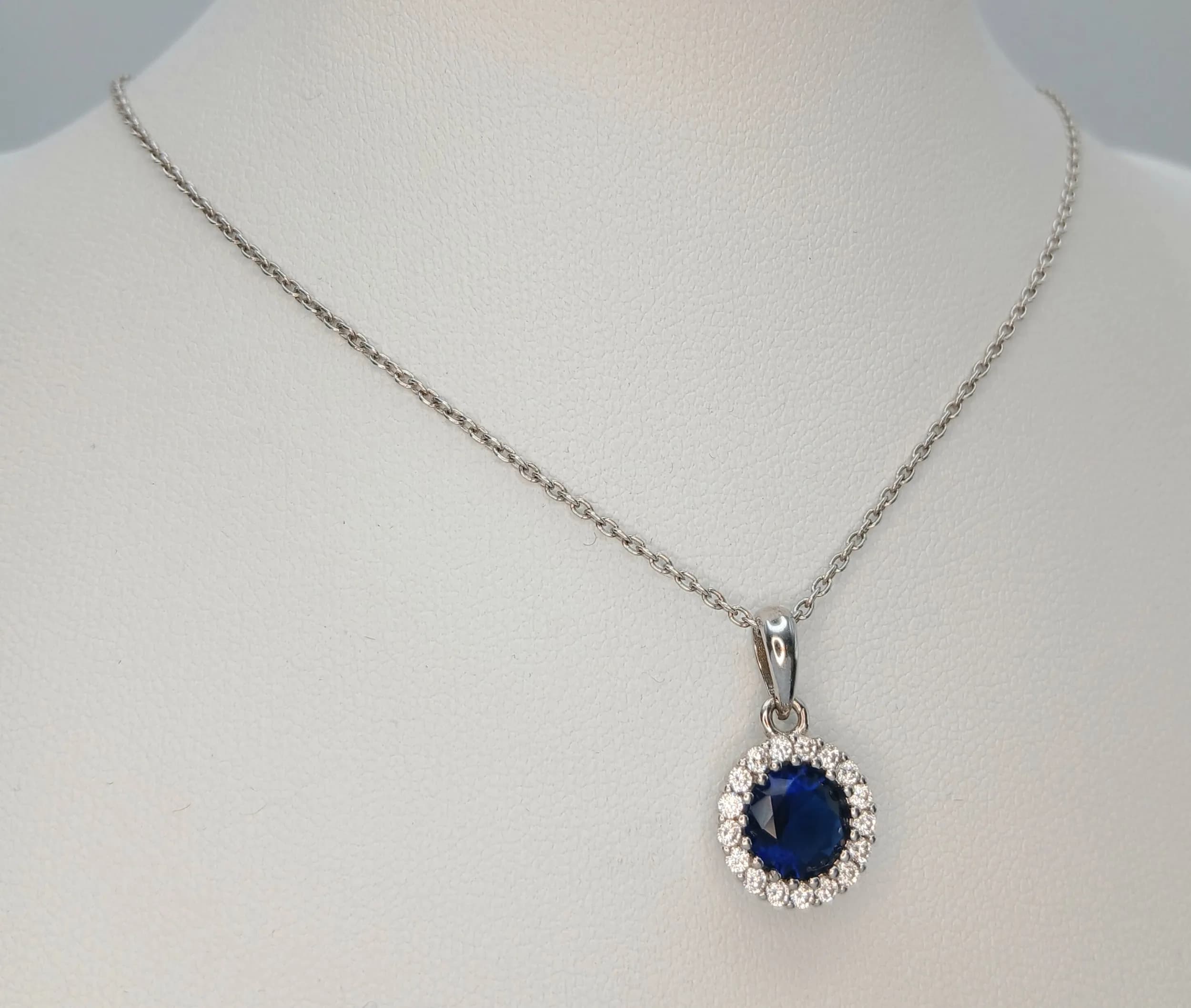 A 925 Sterling Silver Blue Stone and White Stone Pendant Necklace
