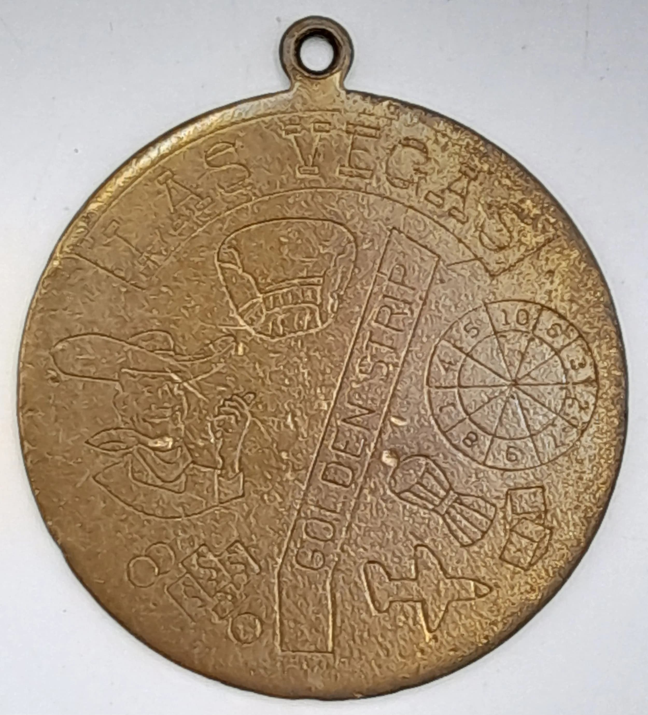 A Vintage Las Vegas Golden Strip Circular Pendant