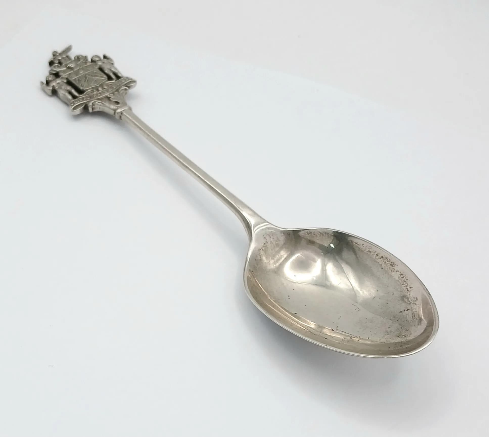 An Antique Sterling Silver Spoon with Masonic Finial. Hallmarks for Birmingham 1921. 18cm. 61g.