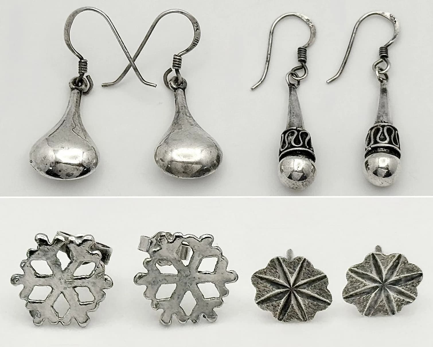 An assorted collection of 4 pairs of vintage silver earrings with various designs. Total weight 8.1G.. Please see photos.