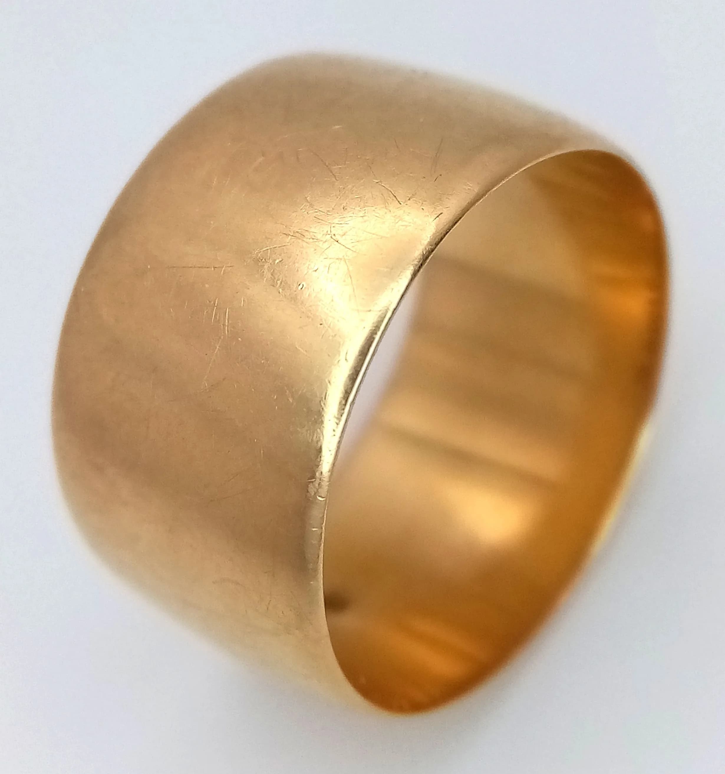 An 18K Yellow Gold Band Ring