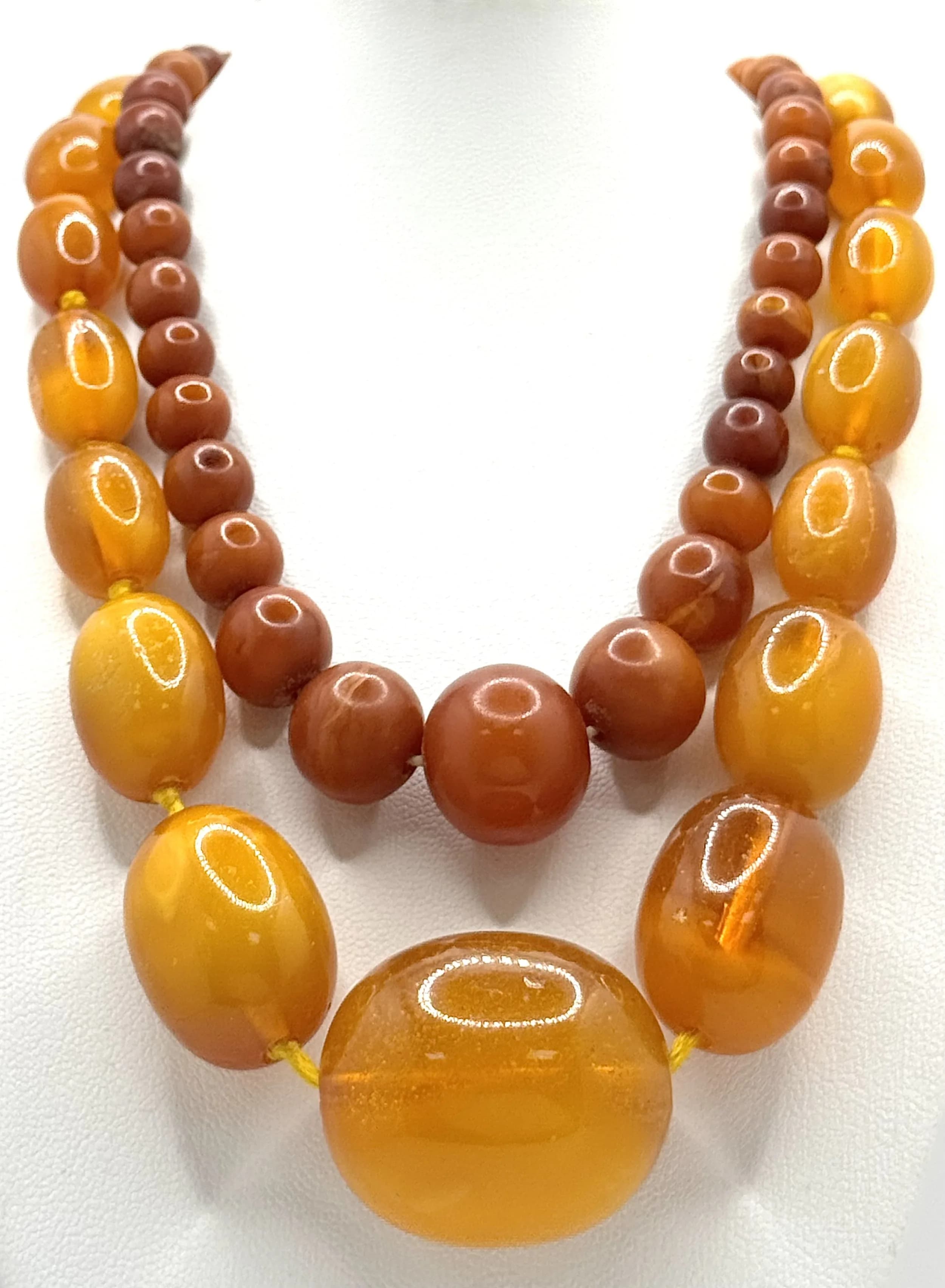 Two Amber Bead Necklaces, Cognac and Butterscotch